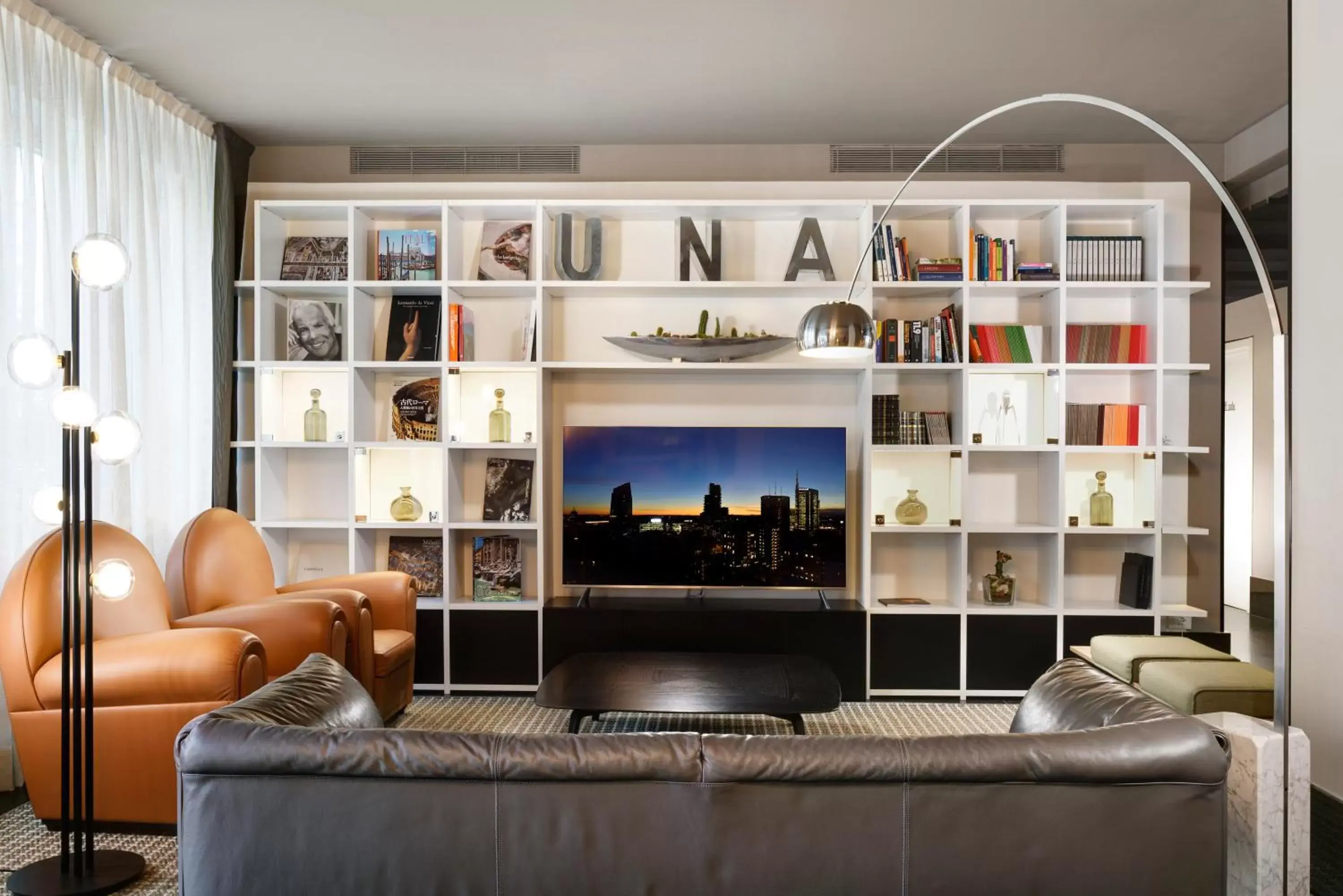 Communal lounge/ TV room, Seating Area in UNAHOTELS Century Milano