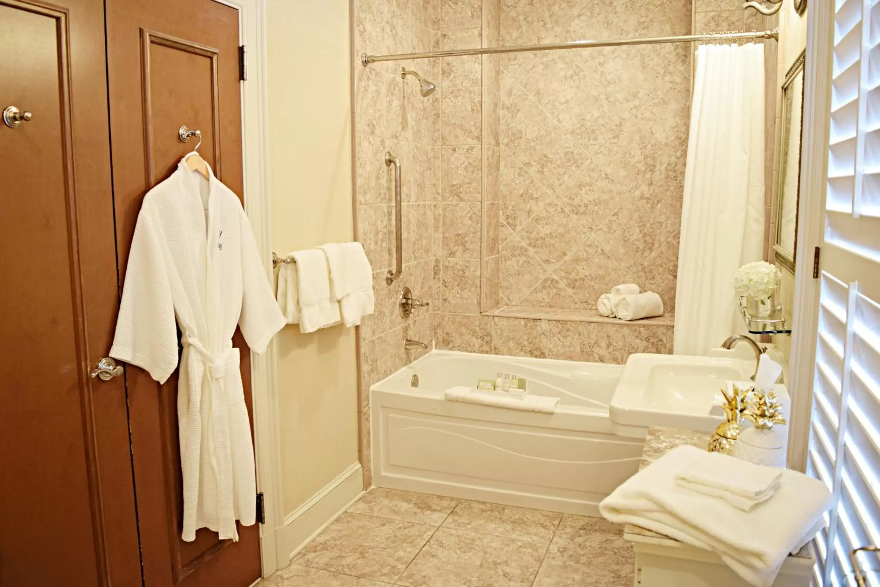 Shower, Bathroom in JH Adams Inn, Trademark Collection by Wyndham