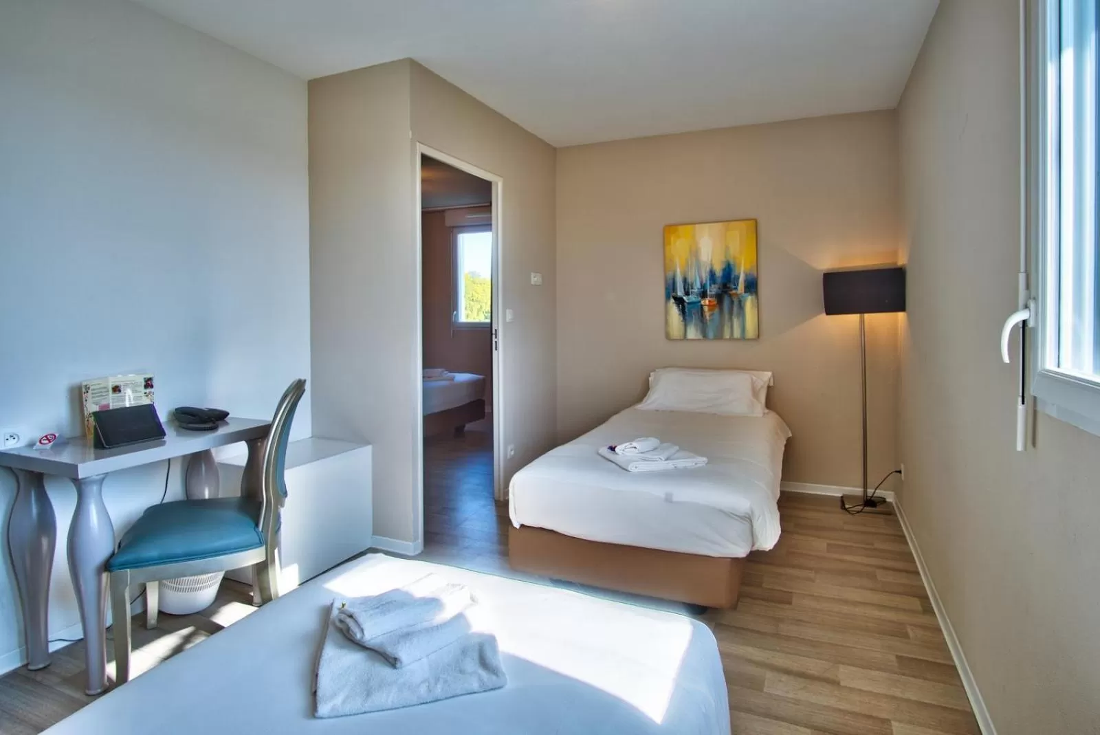 Bed in Adonis Hotel Bayonne