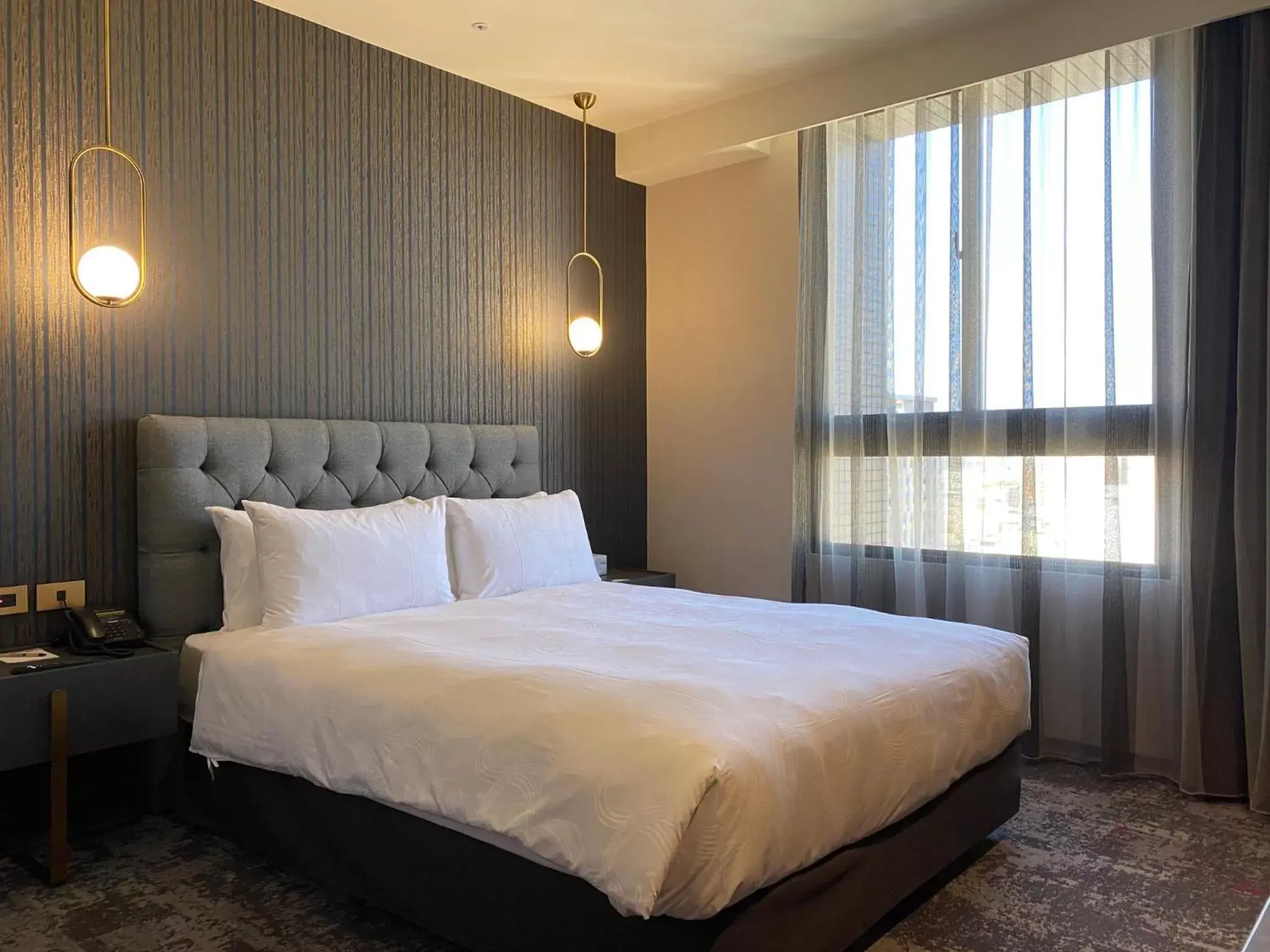 Bed in Tenz Go Hotel Bed in Tenz Go Hotel