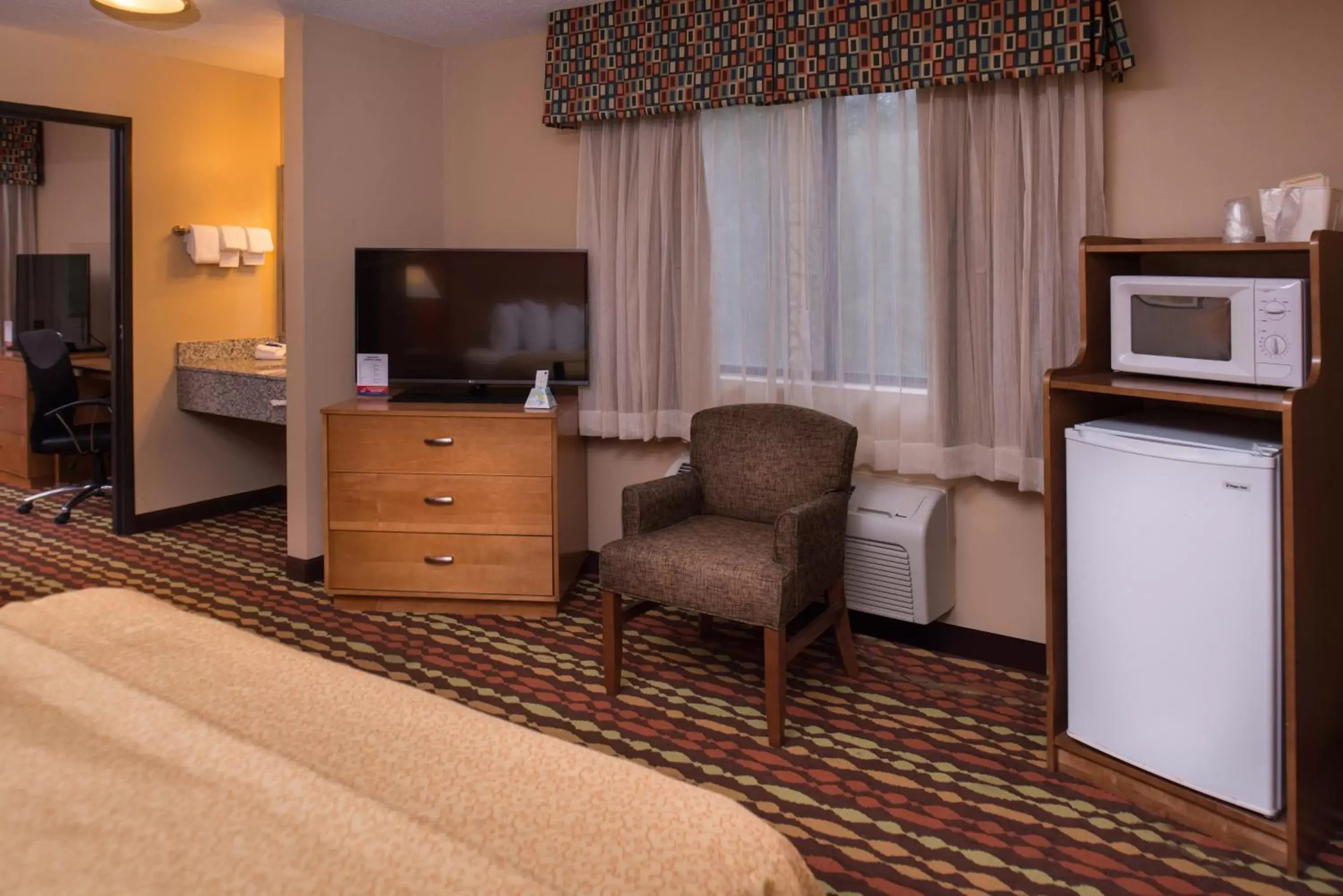 Queen Room with Two Queen Beds in Best Western Ambassador Inn & Suites