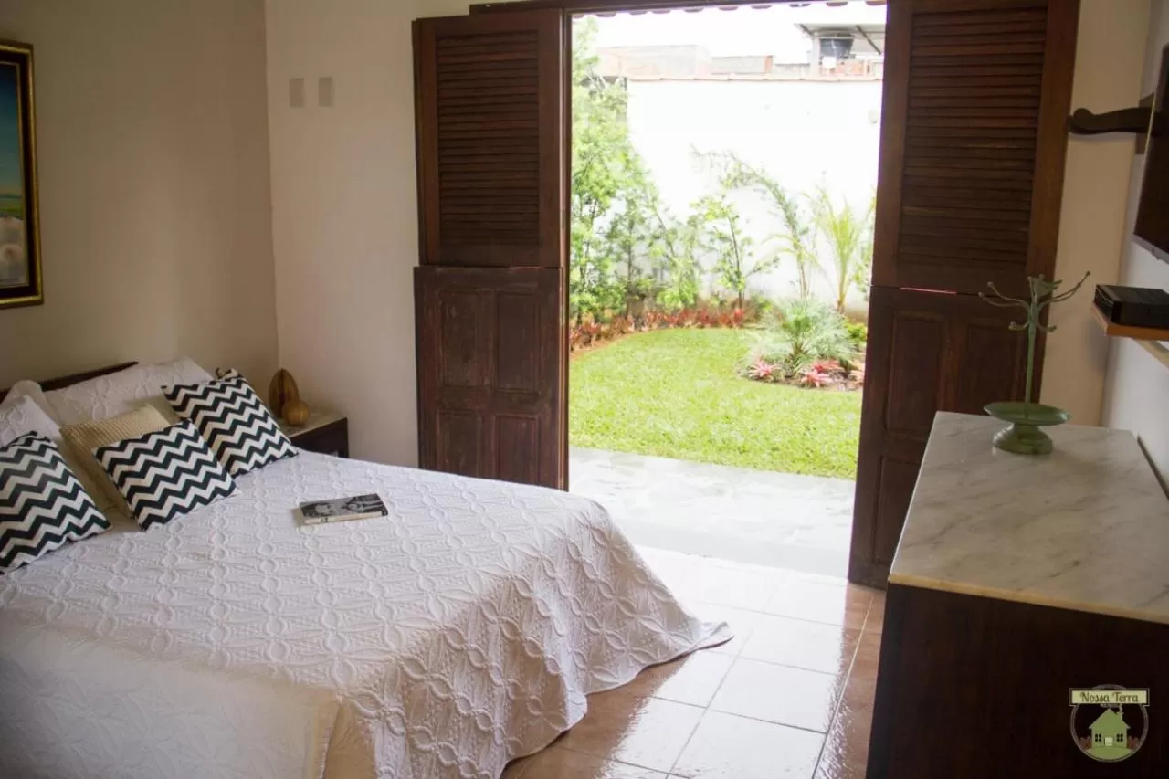 Bed in Pousada Nossa Terra