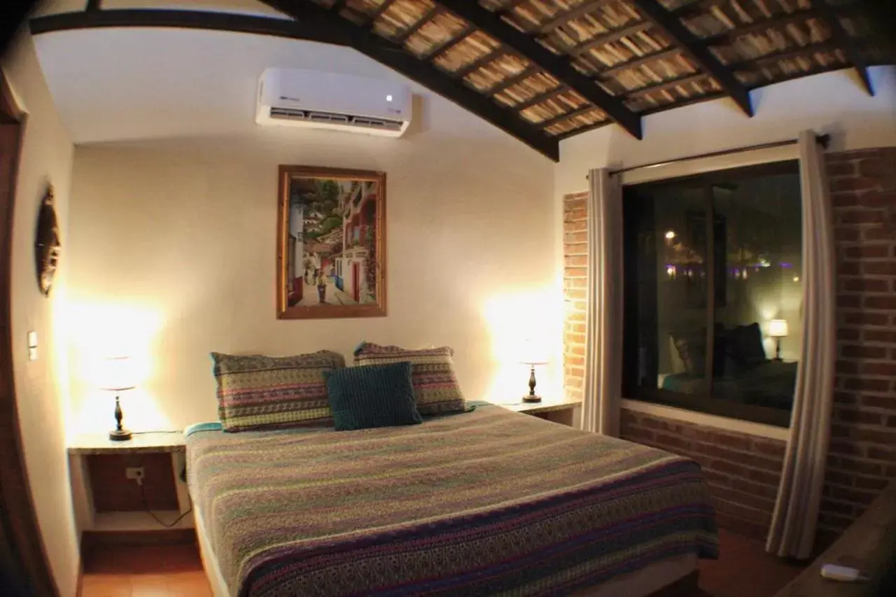 Bed in Sukasa Bungalows