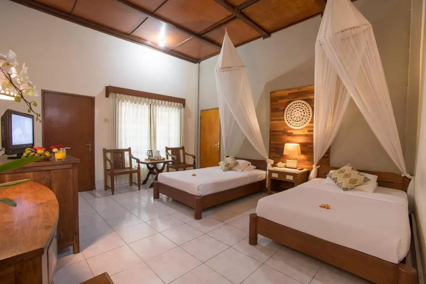 Photo of the whole room, Bed in Bumi Ayu Bungalow Sanur