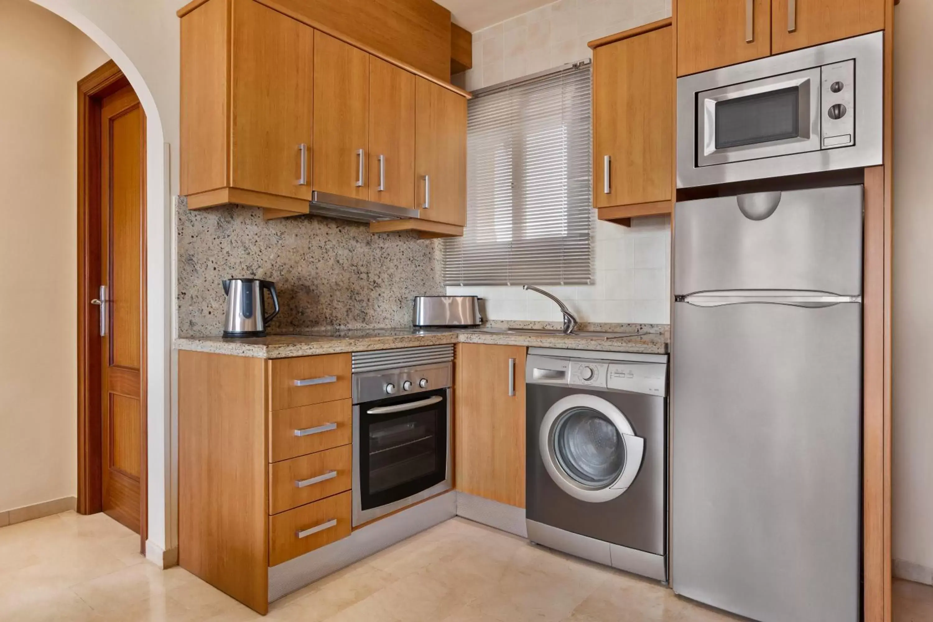 Kitchen or kitchenette, Kitchen/Kitchenette in Ramada Hotel & Suites by Wyndham Costa del Sol