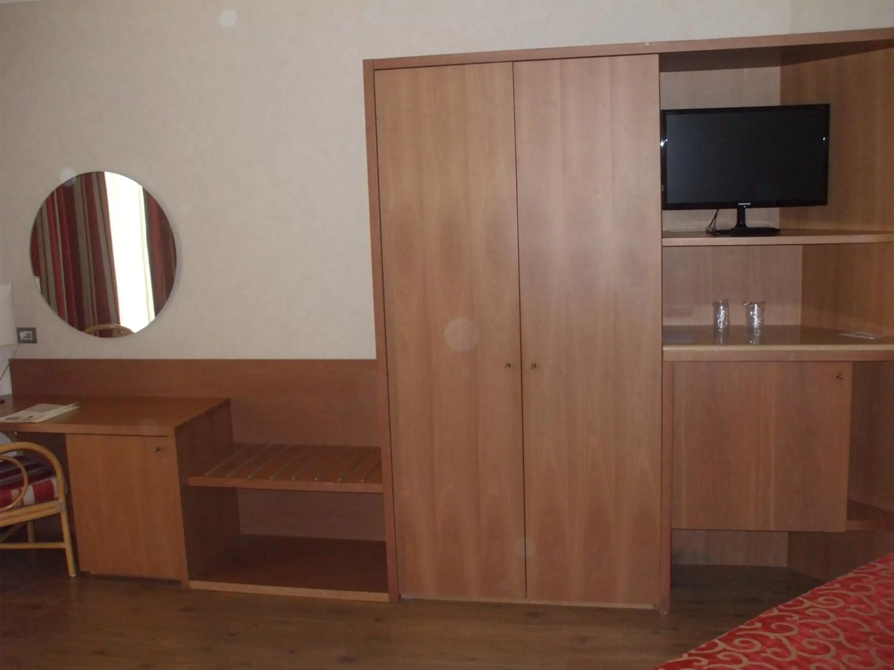 Bedroom, TV/Entertainment Center in Nicotel Barletta