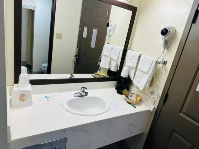 Bathroom in Super 8 by Wyndham Branson By Andy Williams Theatre