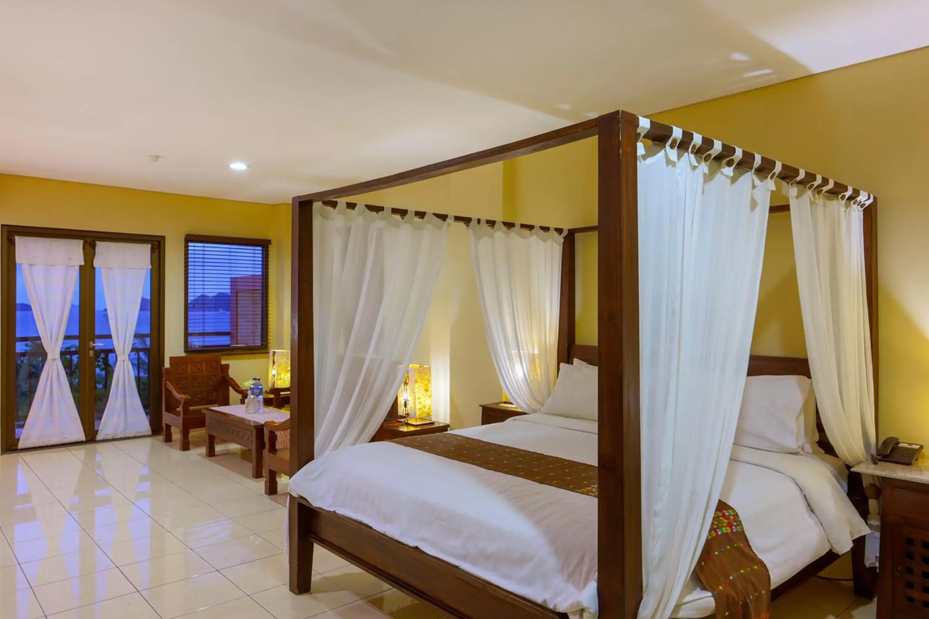 Bed in The Jayakarta Suites Komodo Flores