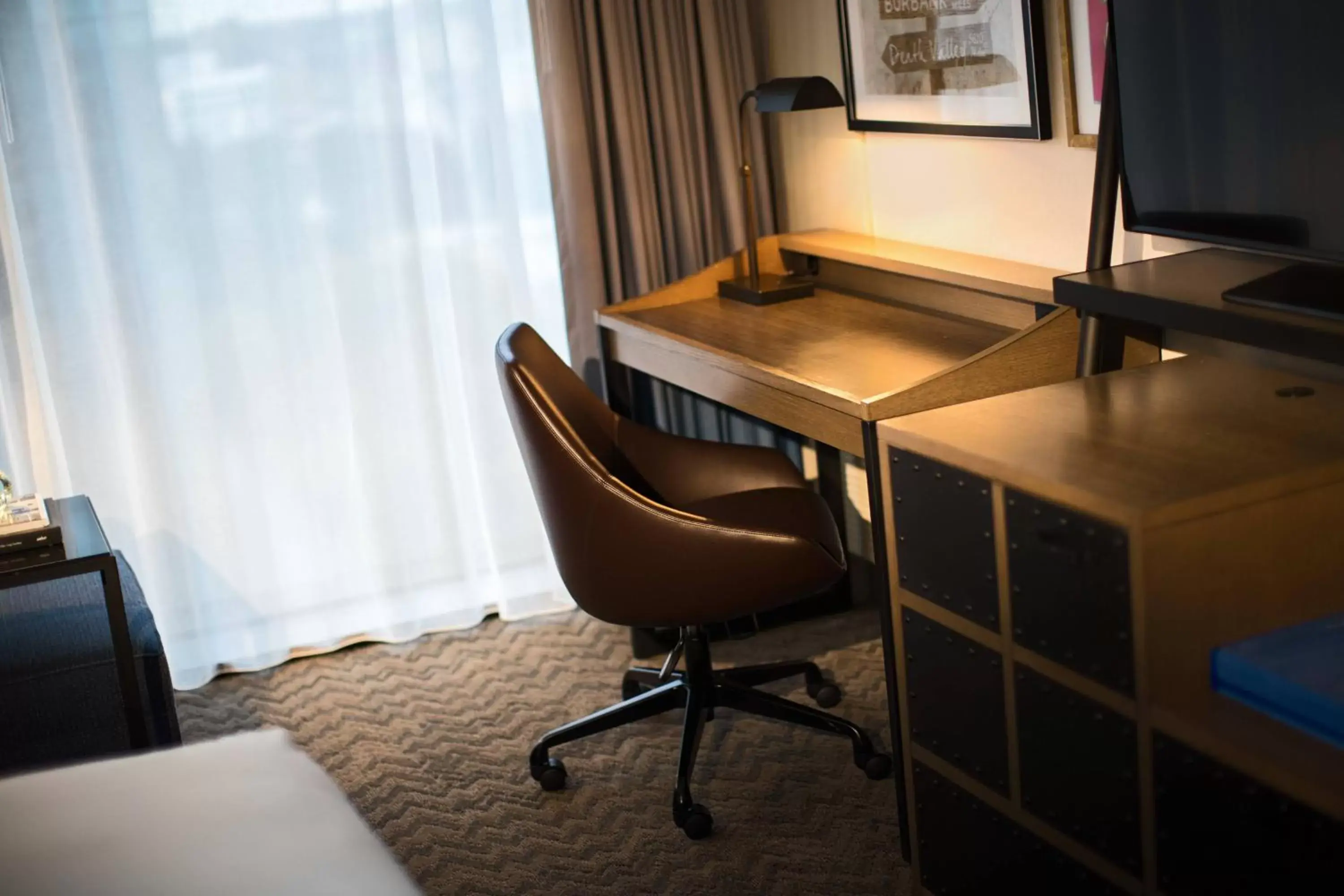 Bedroom, TV/Entertainment Center in Renaissance Toledo Downtown Hotel