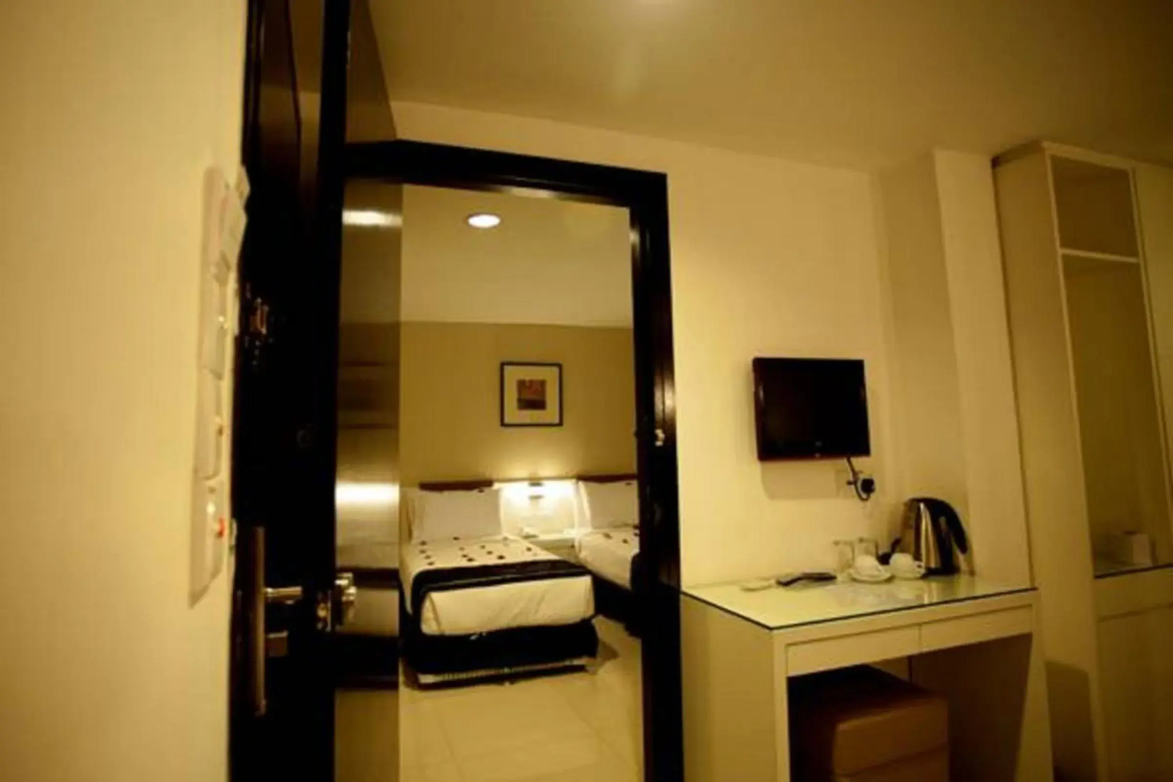 Bedroom, TV/Entertainment Center in Mangga Boutique Hotel