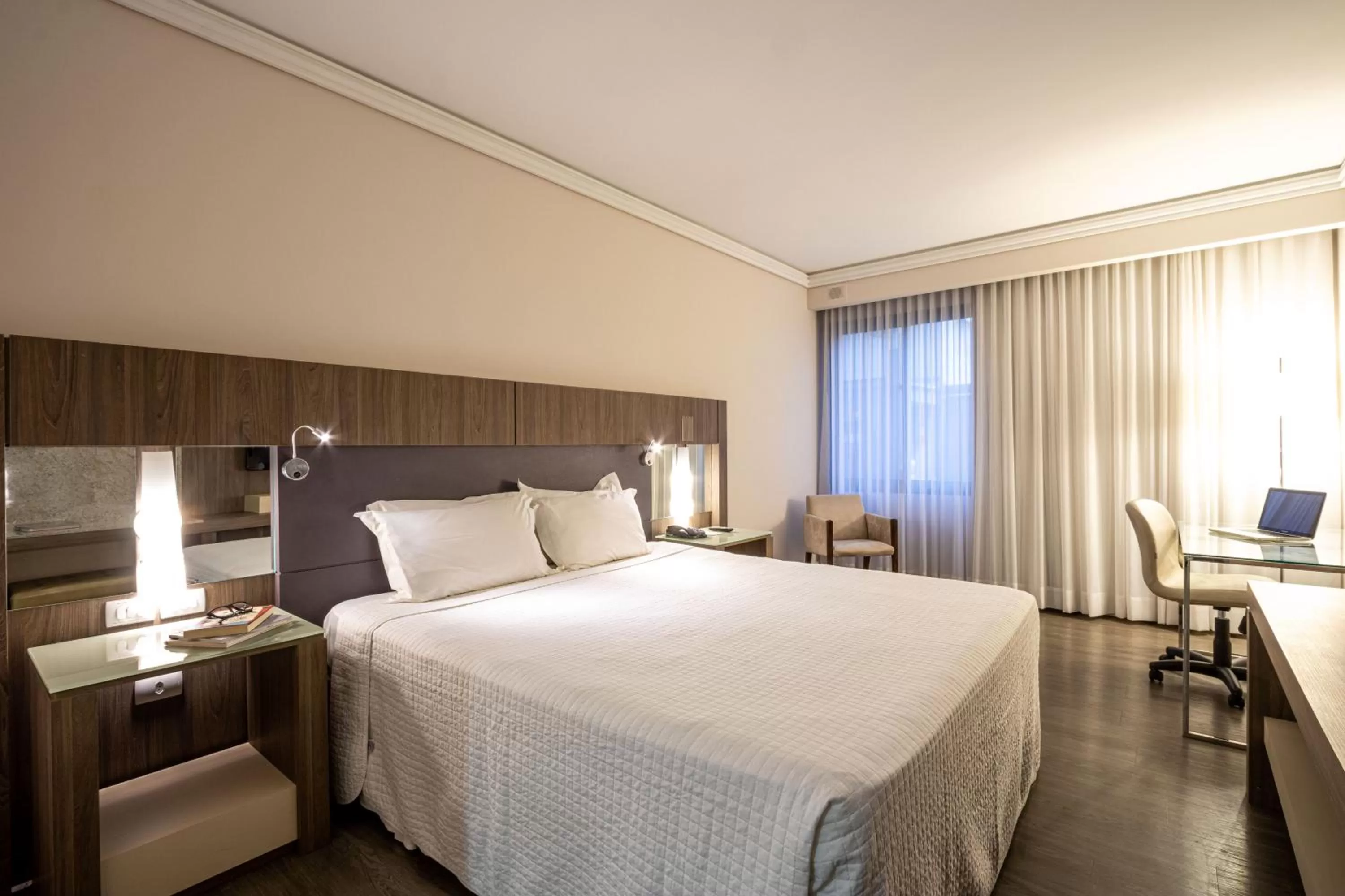 Bed in Grand Mercure Curitiba Rayon