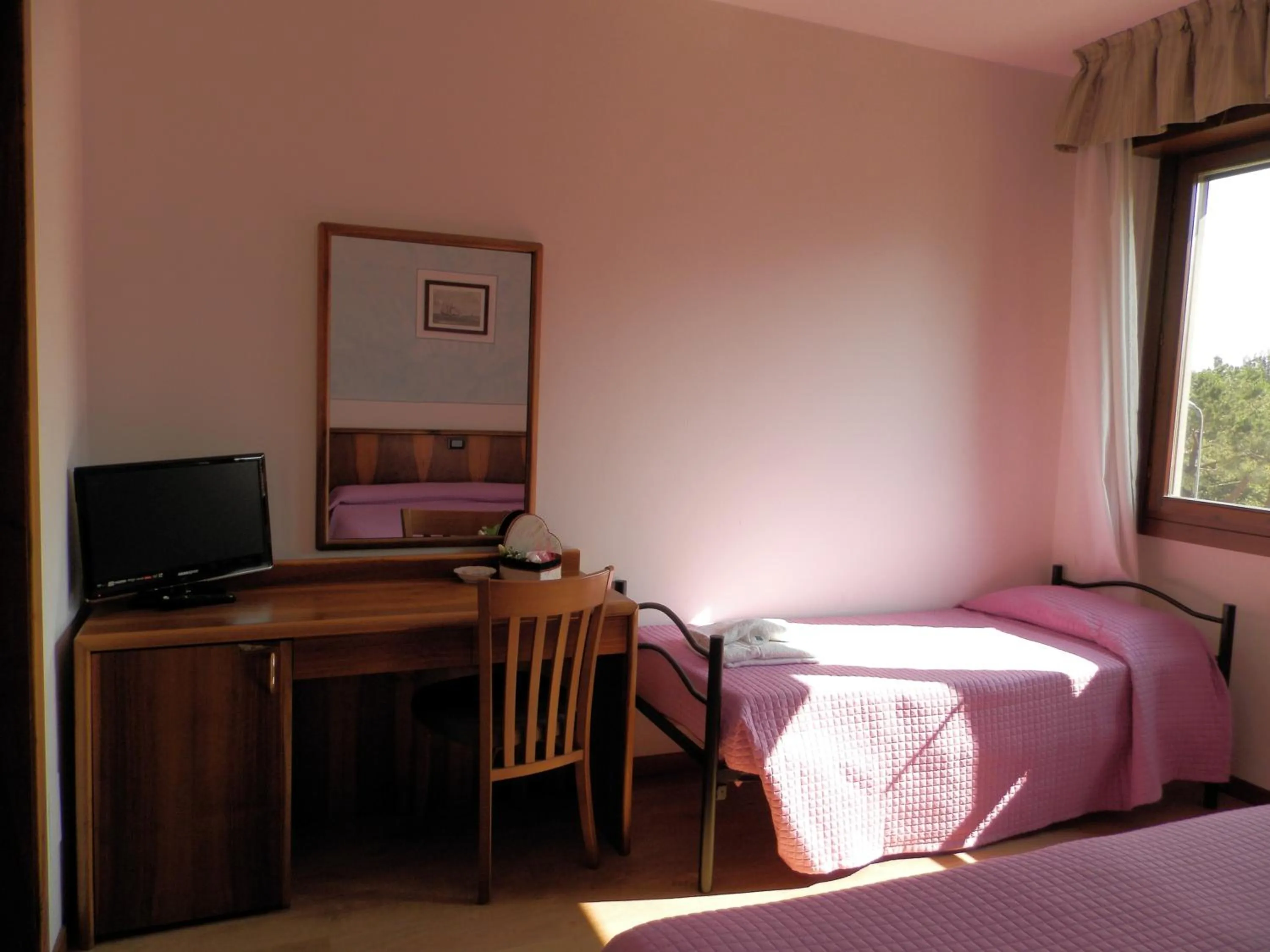 Bed in Continental Hotel