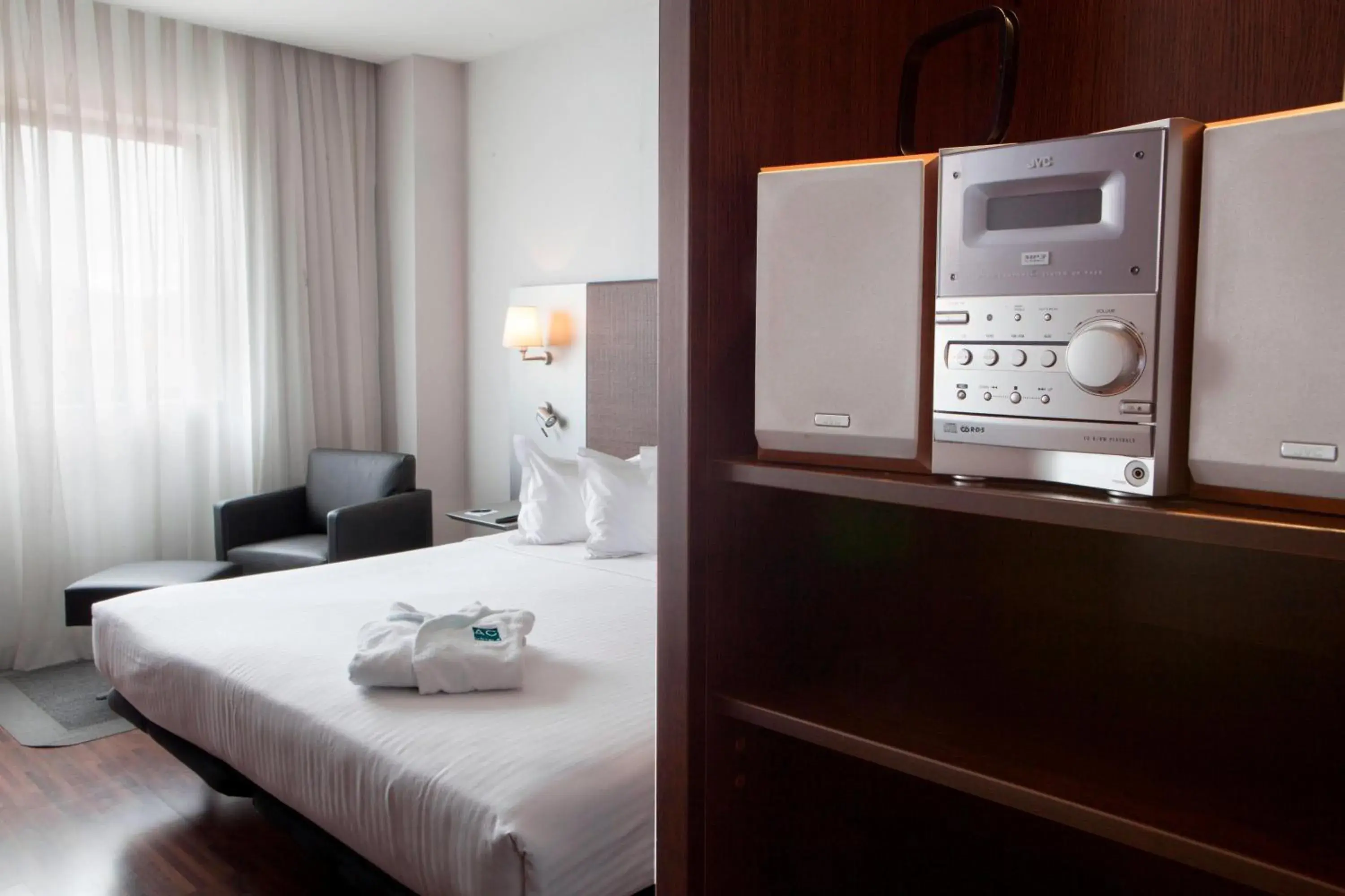 Photo of the whole room, Bed in AC Hotel Gijón by Marriott