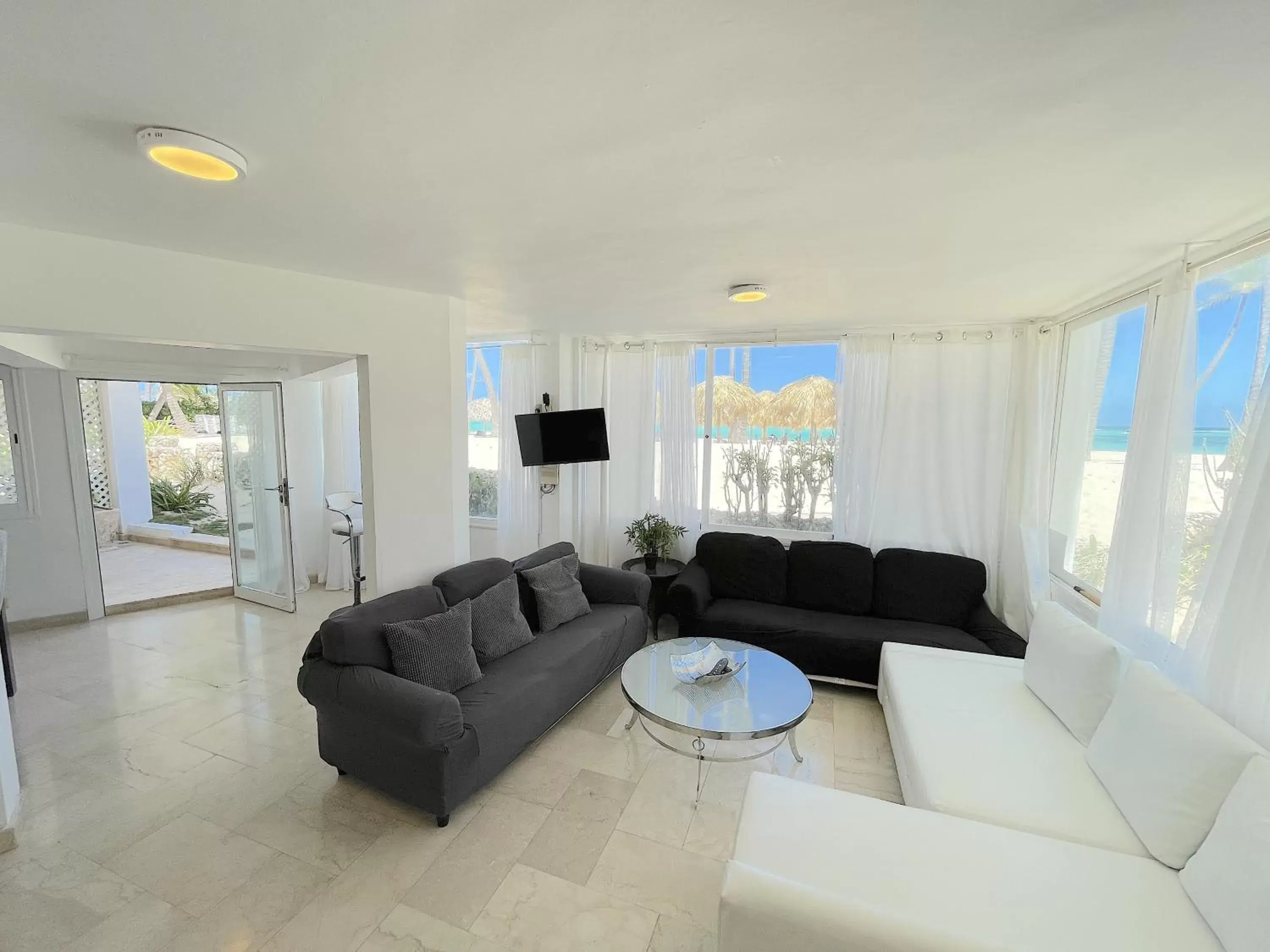 TV and multimedia, Seating Area in HOTEL Beach VILLAS Los Corales WIFI & BBQ BEACH CLUB