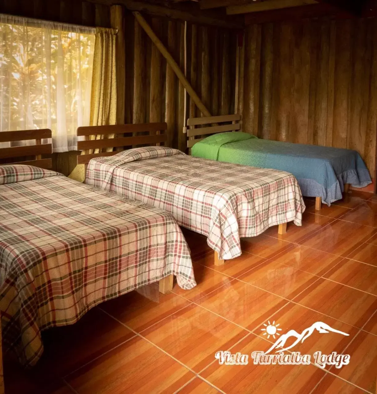 Bed in Vista Turrialba Lodge