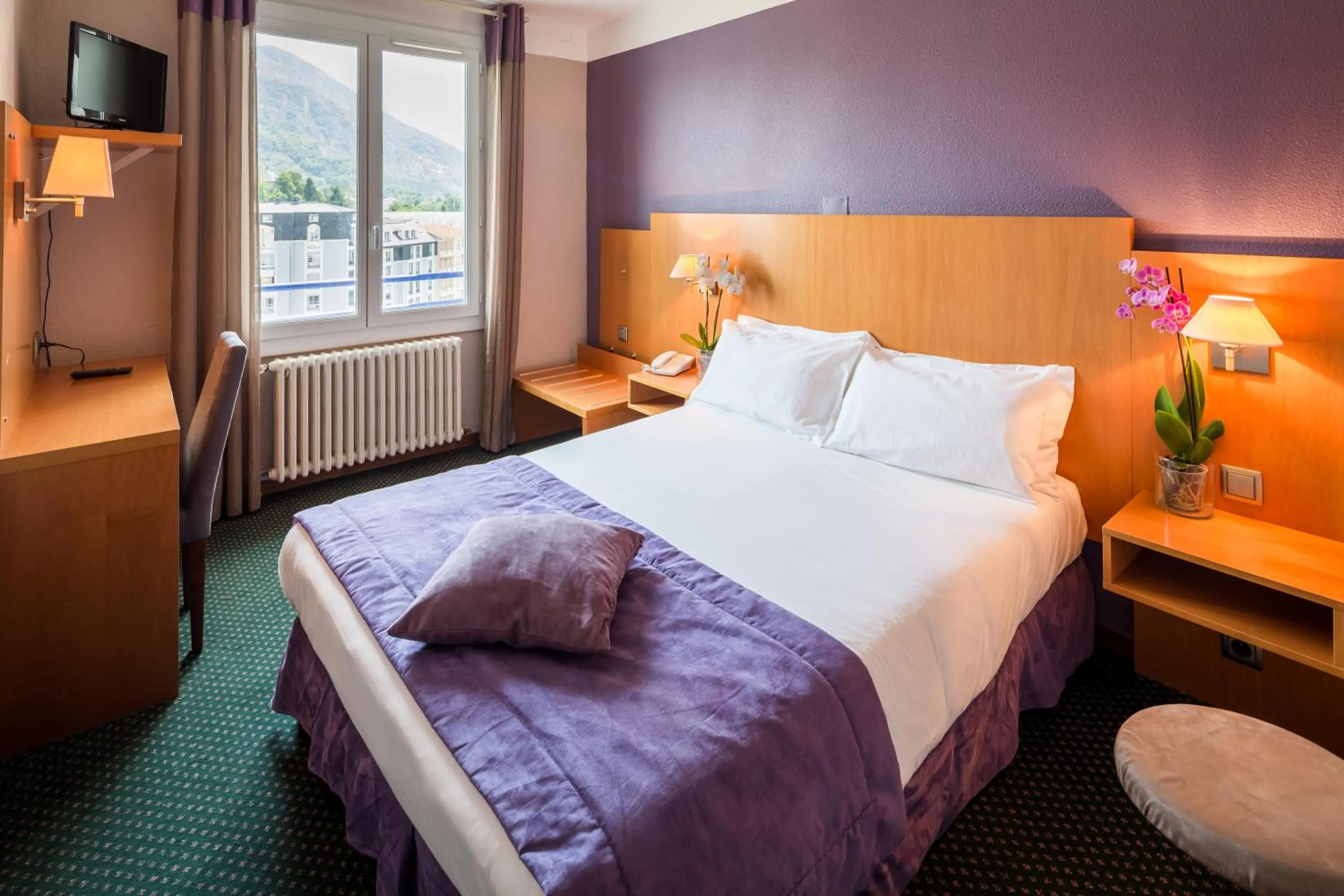 Photo of the whole room, Bed in Hôtel Christina Lourdes