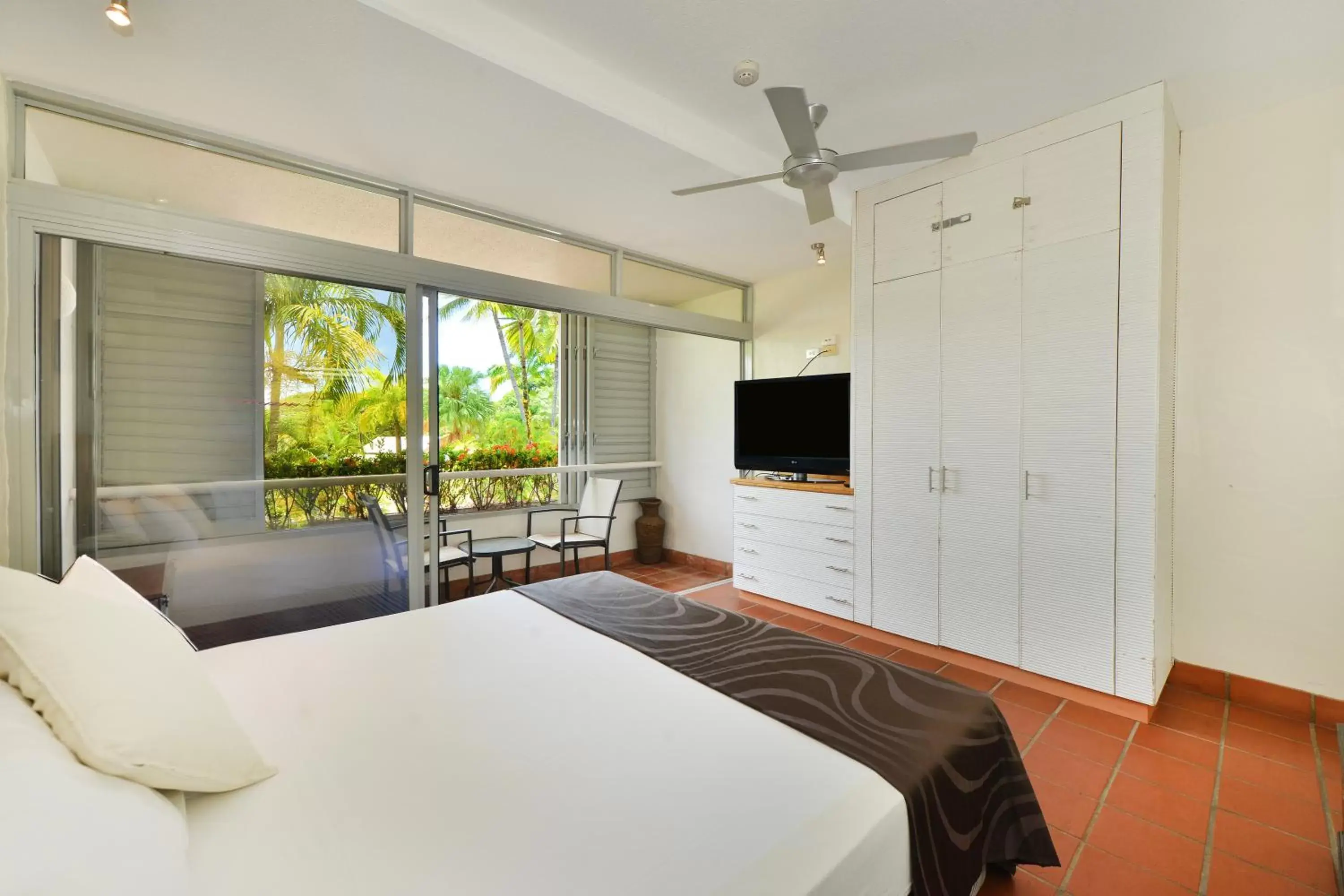 Bedroom in Club Tropical Resort with Onsite Reception & Check In
