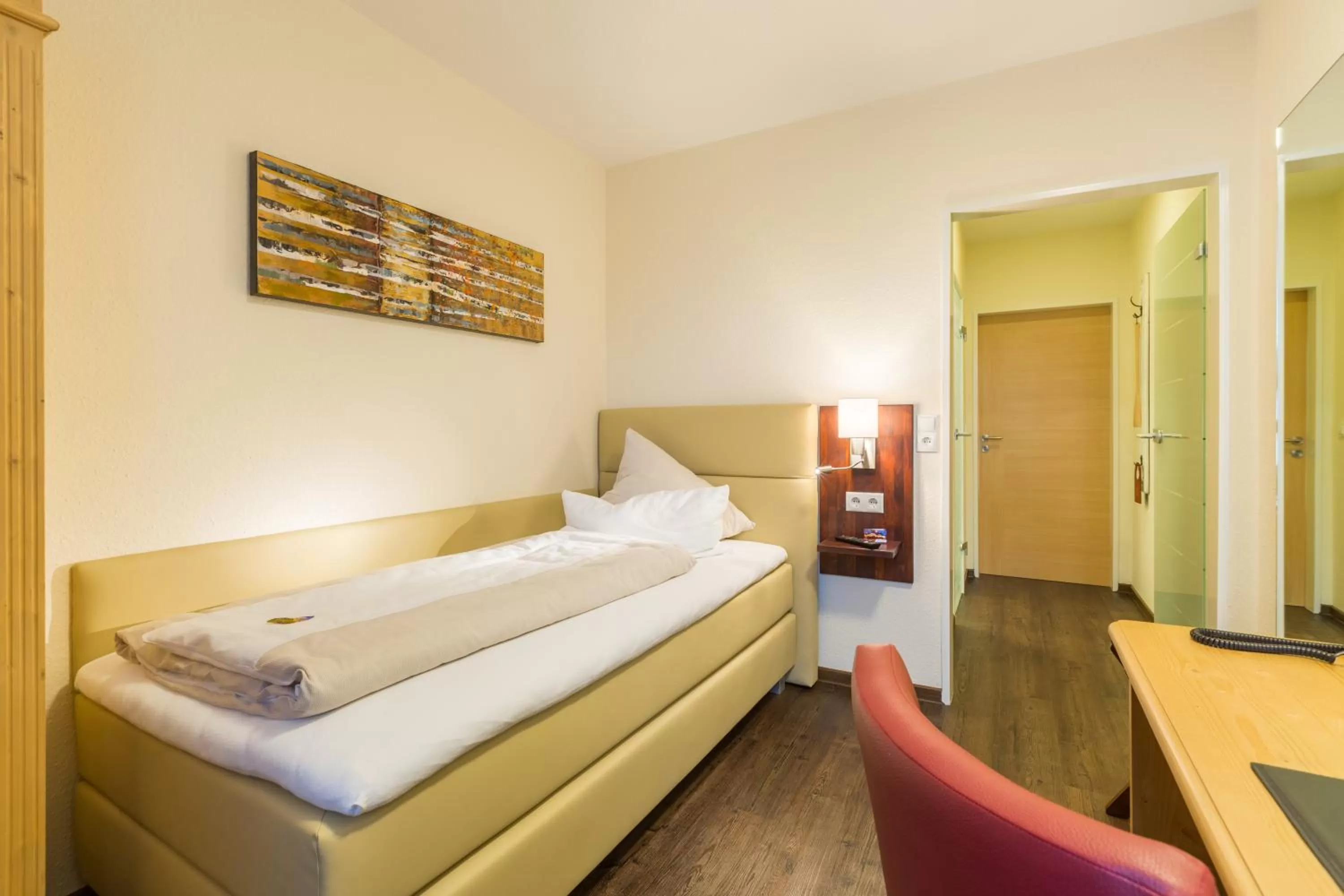 Photo of the whole room, Bed in Burgdorfs Hotel & Restaurant