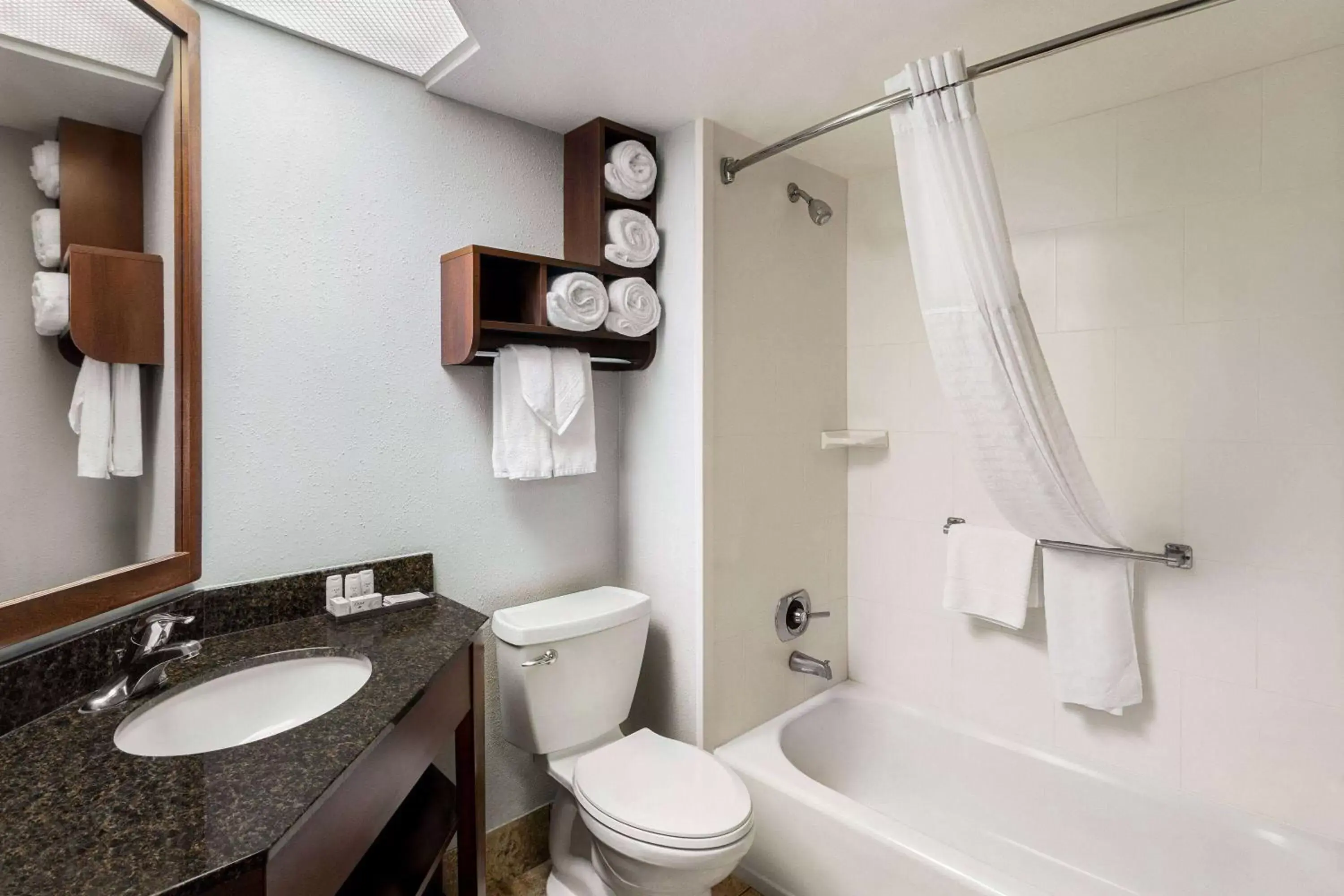 TV and multimedia, Bathroom in AmericInn by Wyndham Madison West