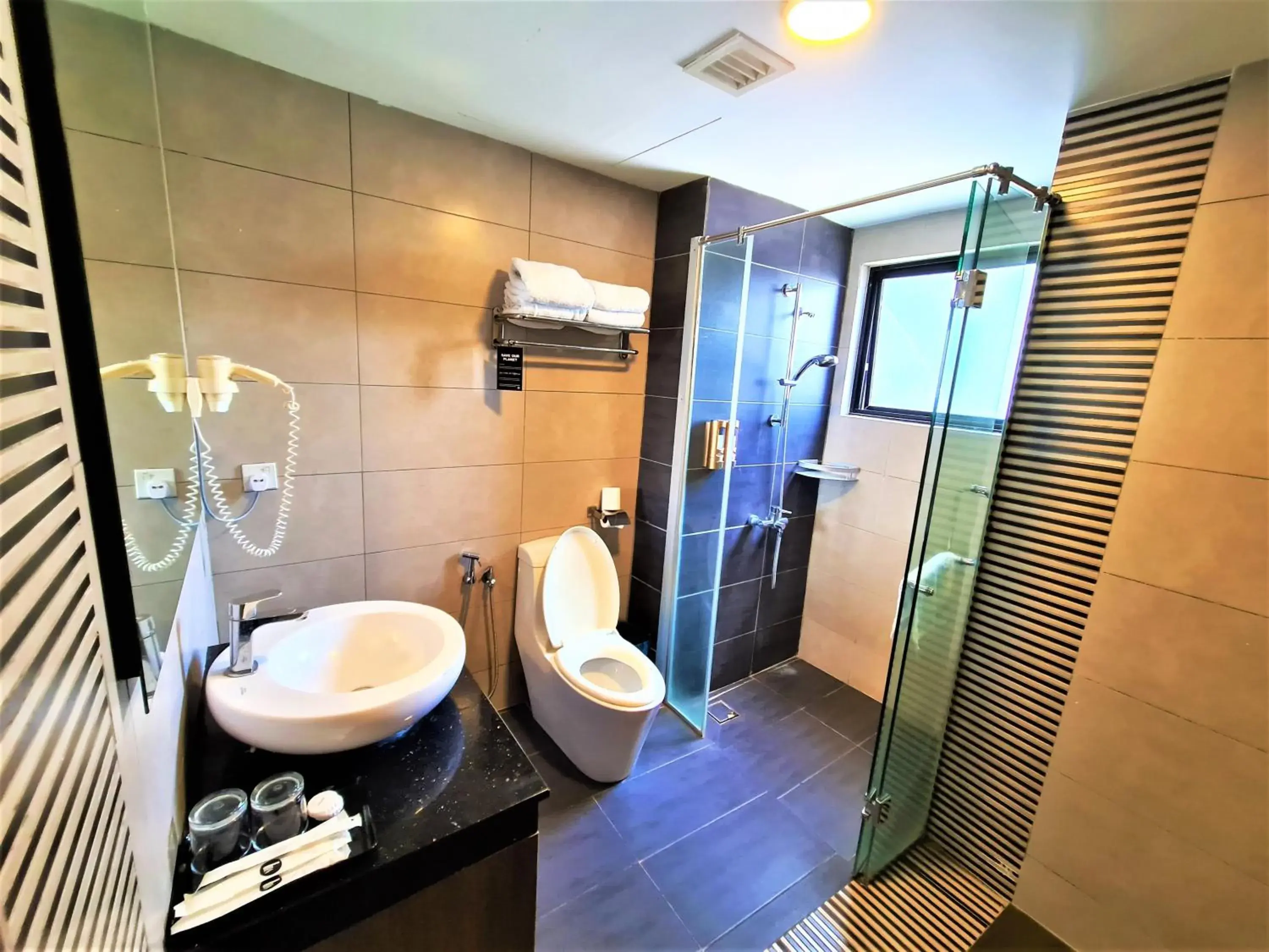 Bathroom in Nexus Business Suite Hotel