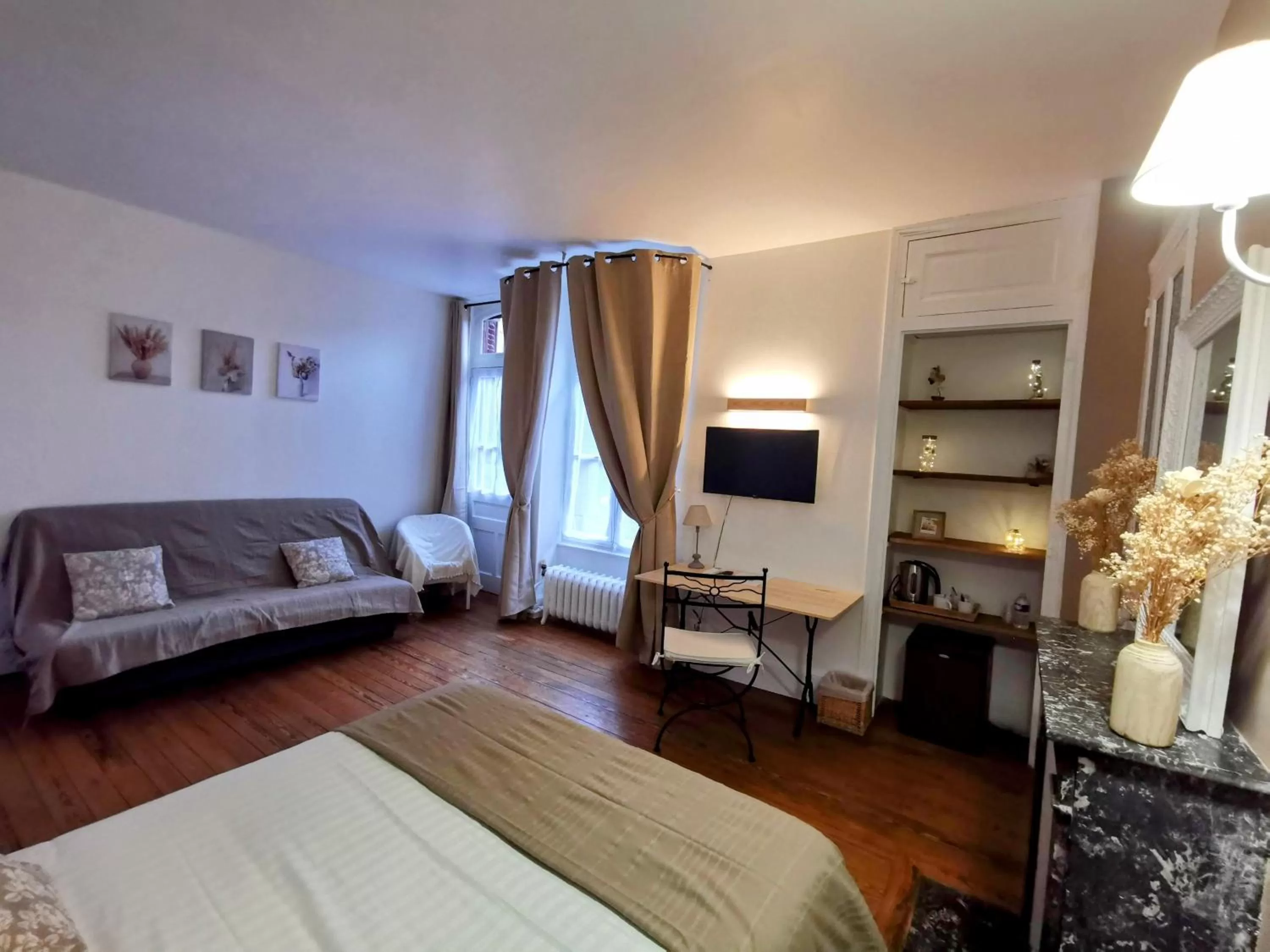 Photo of the whole room, Bed in Logis Hotel La Tourelle du Beffroi