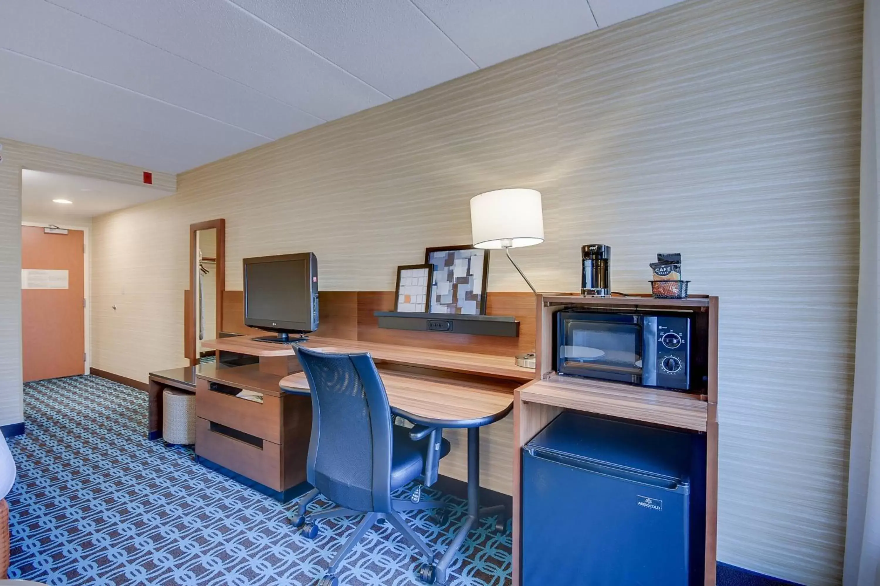 Photo of the whole room, TV/Entertainment Center in Fairfield Inn Boston Woburn