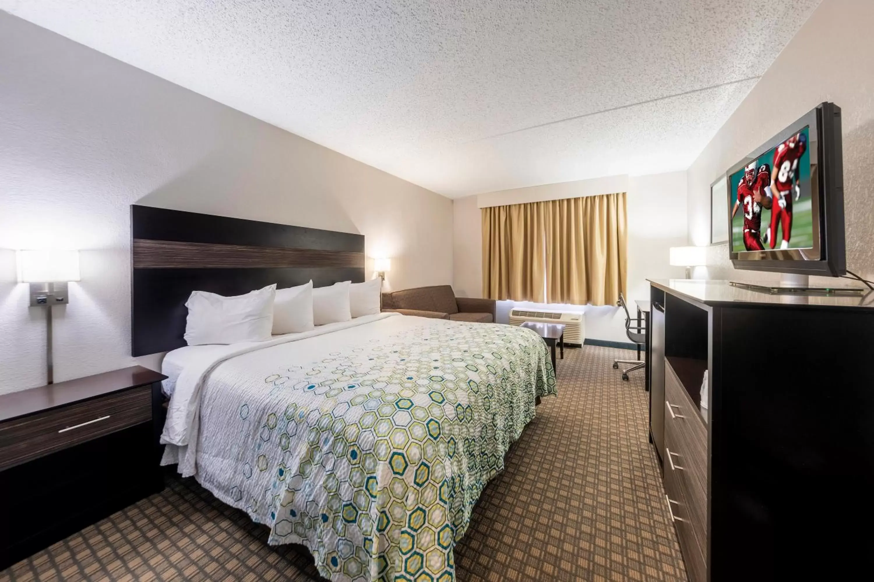 Photo of the whole room, Bed in HomeTown Inn by Red Roof East Syracuse