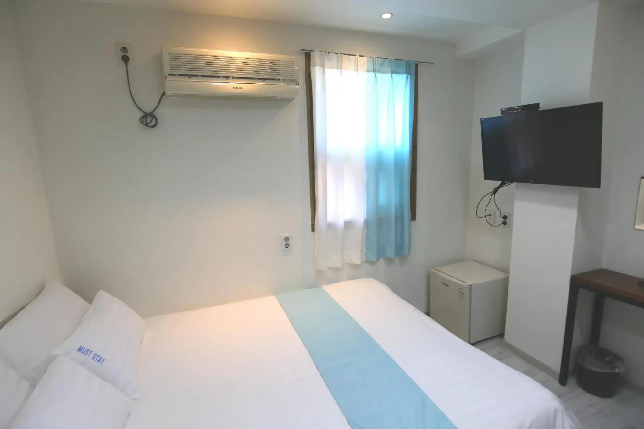 Bed in MUST STAY HOTEL Myeongdong