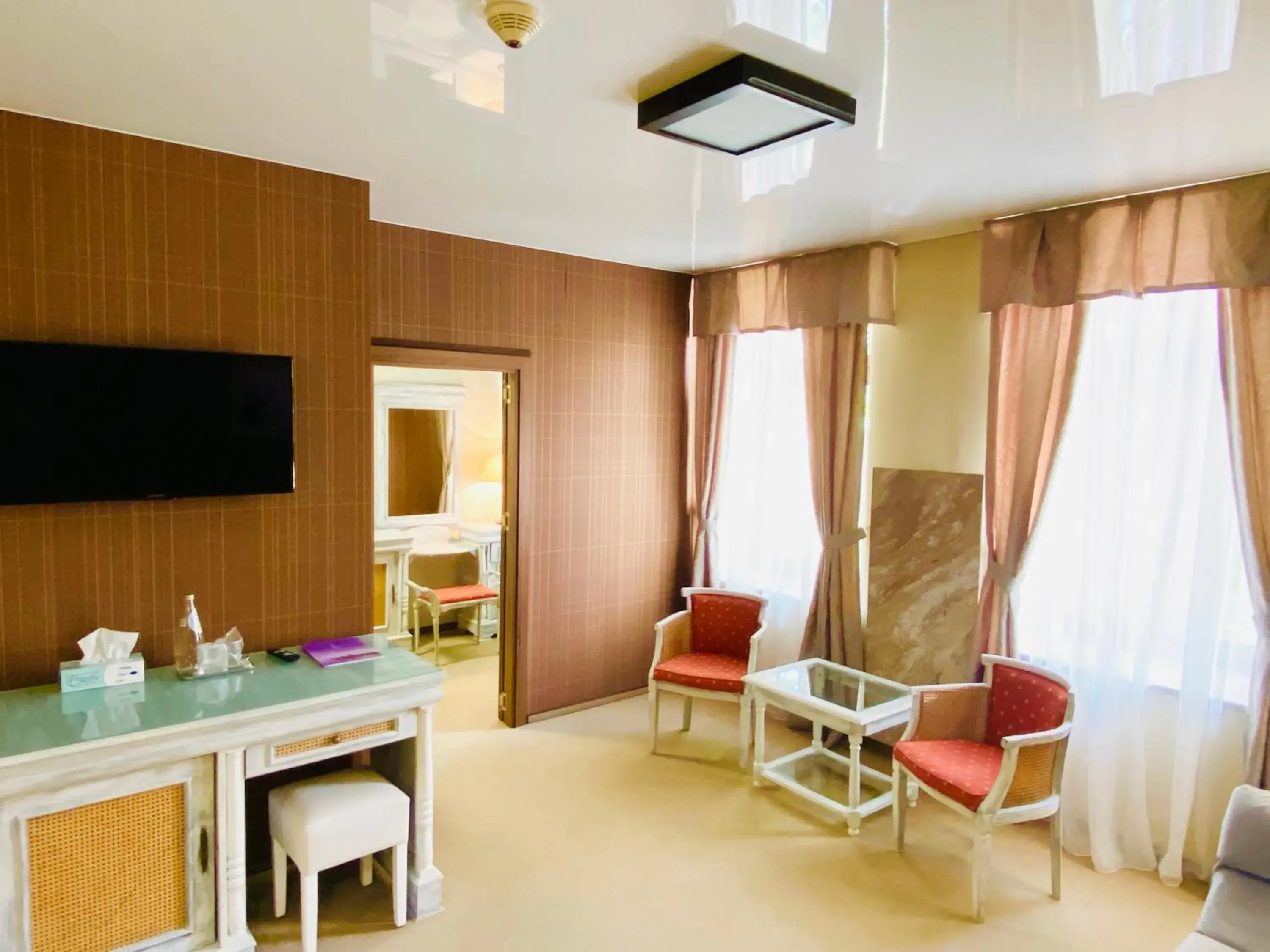 TV and multimedia, TV/Entertainment Center in Levoslav House Hotel