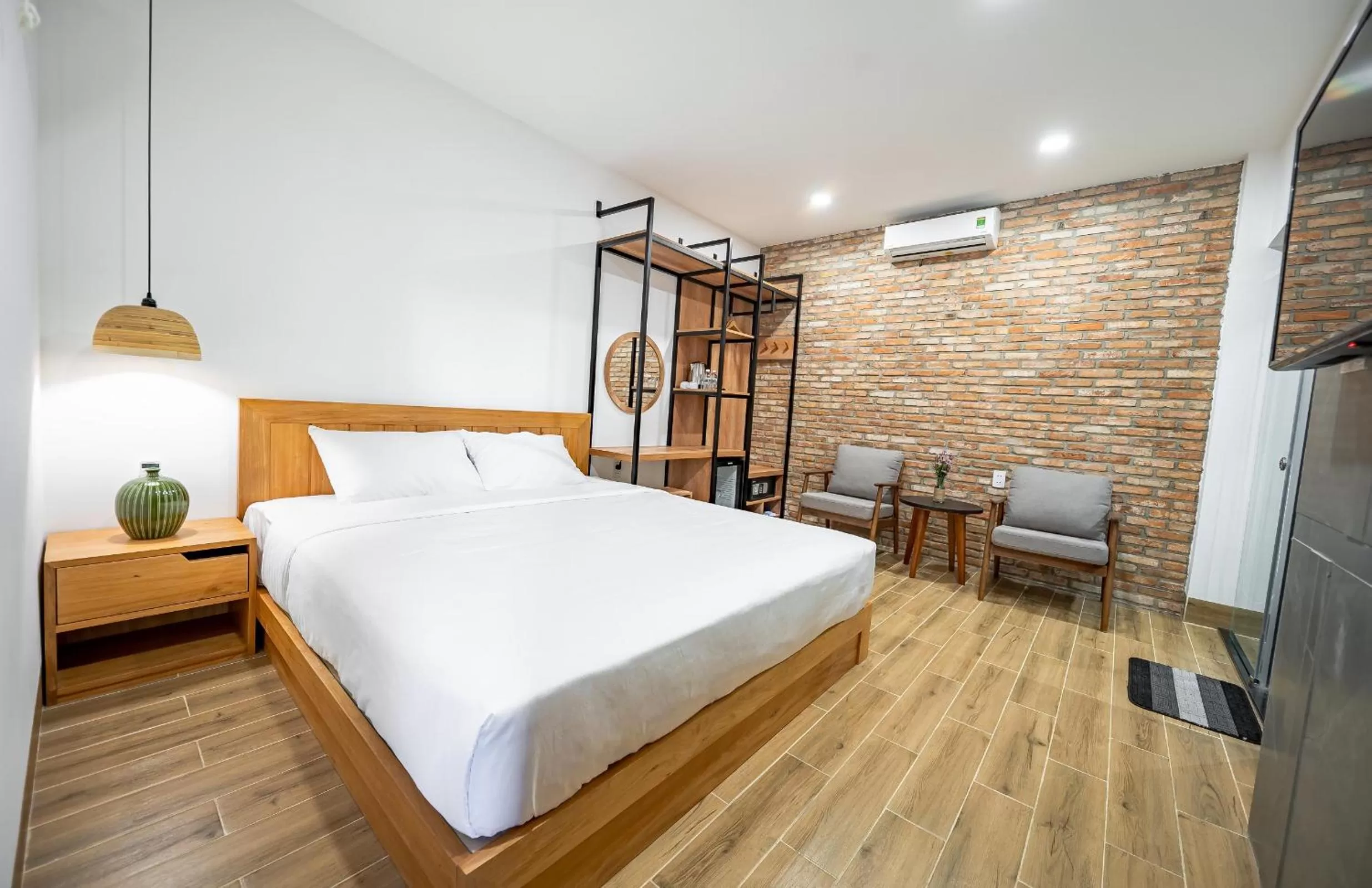 Bed in Coast House Boutique Hotel