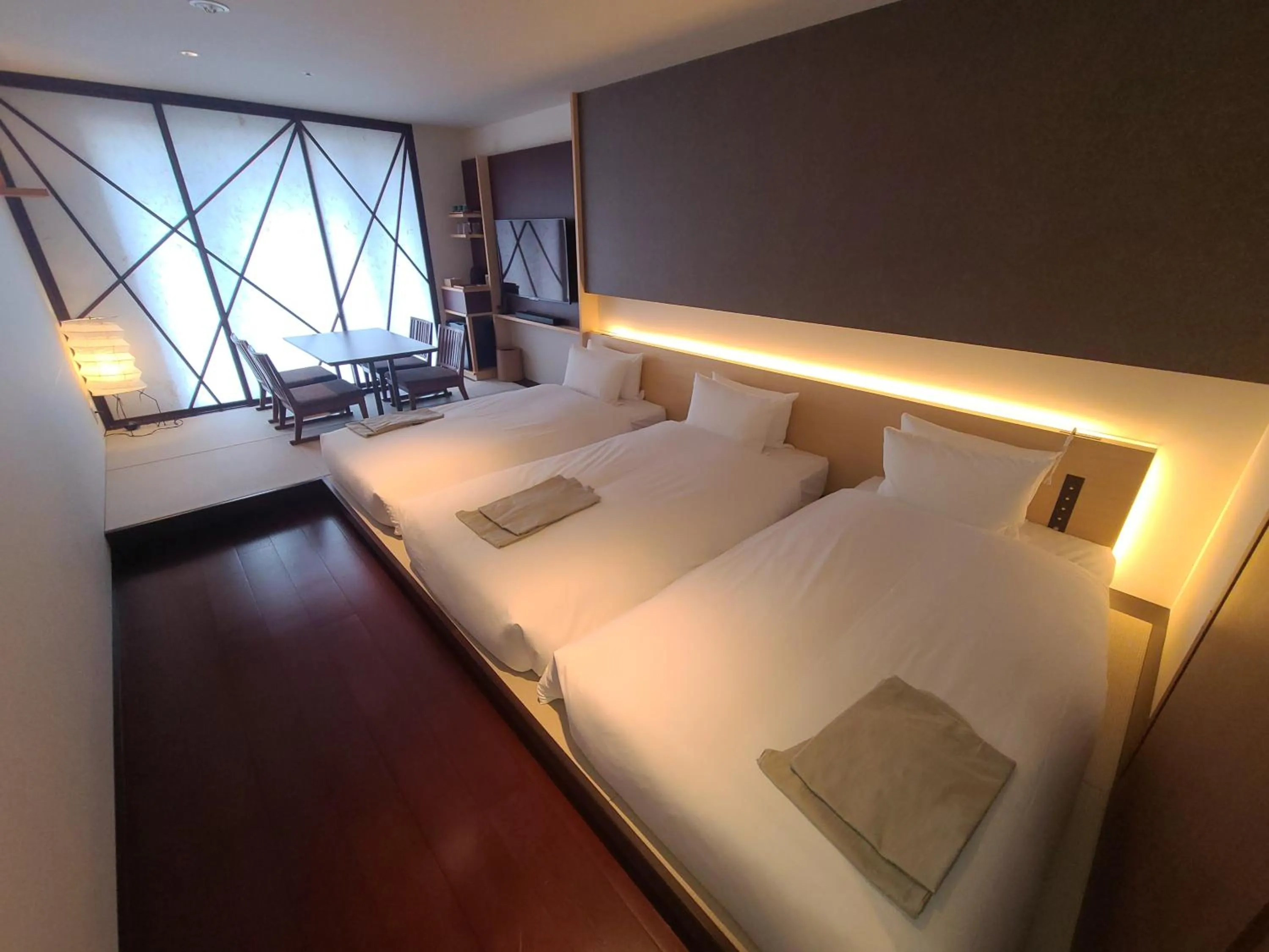 Bed in HOTEL AMANEK Kanazawa