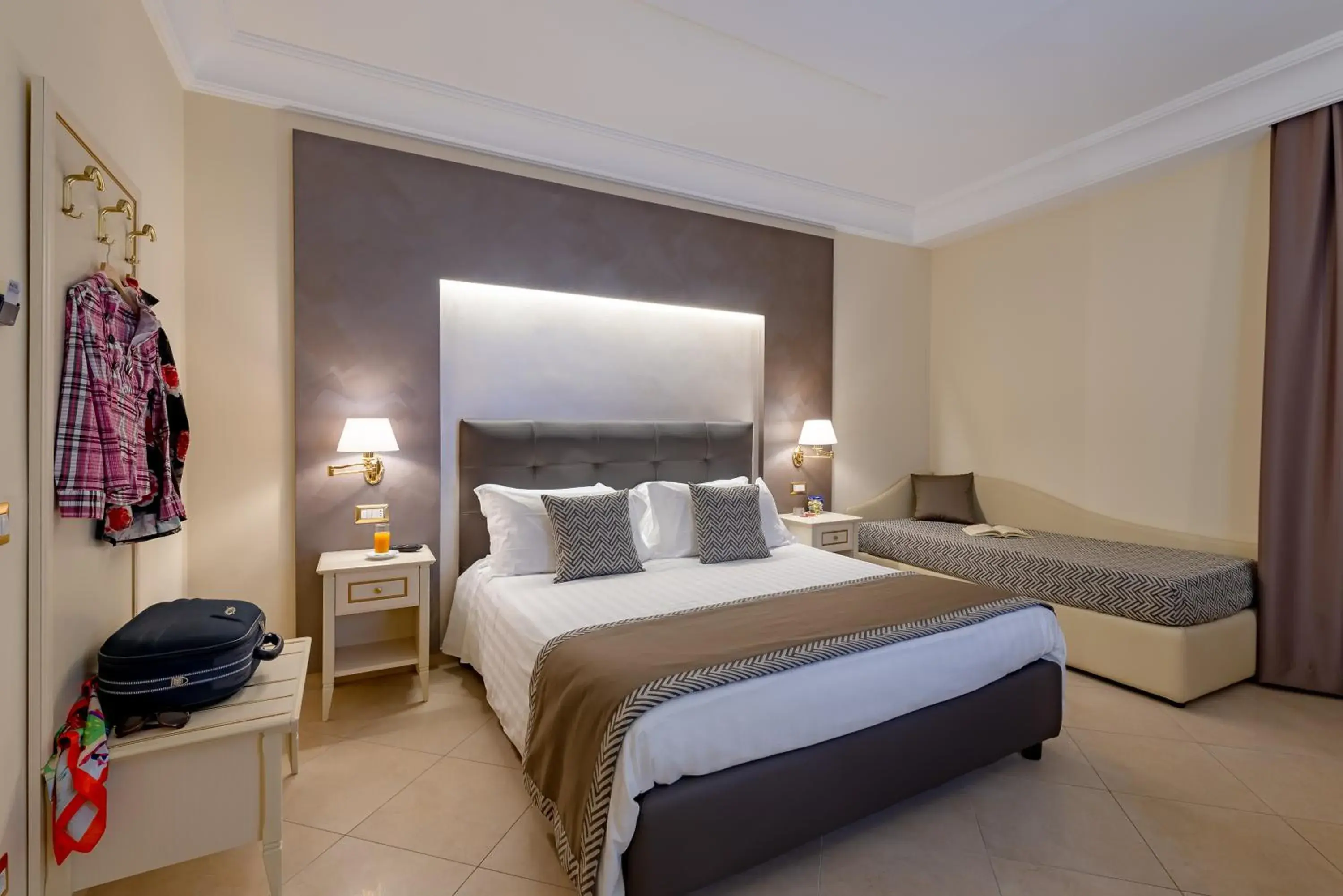 Bed in Vittorio Emanuele Boutique Hotel