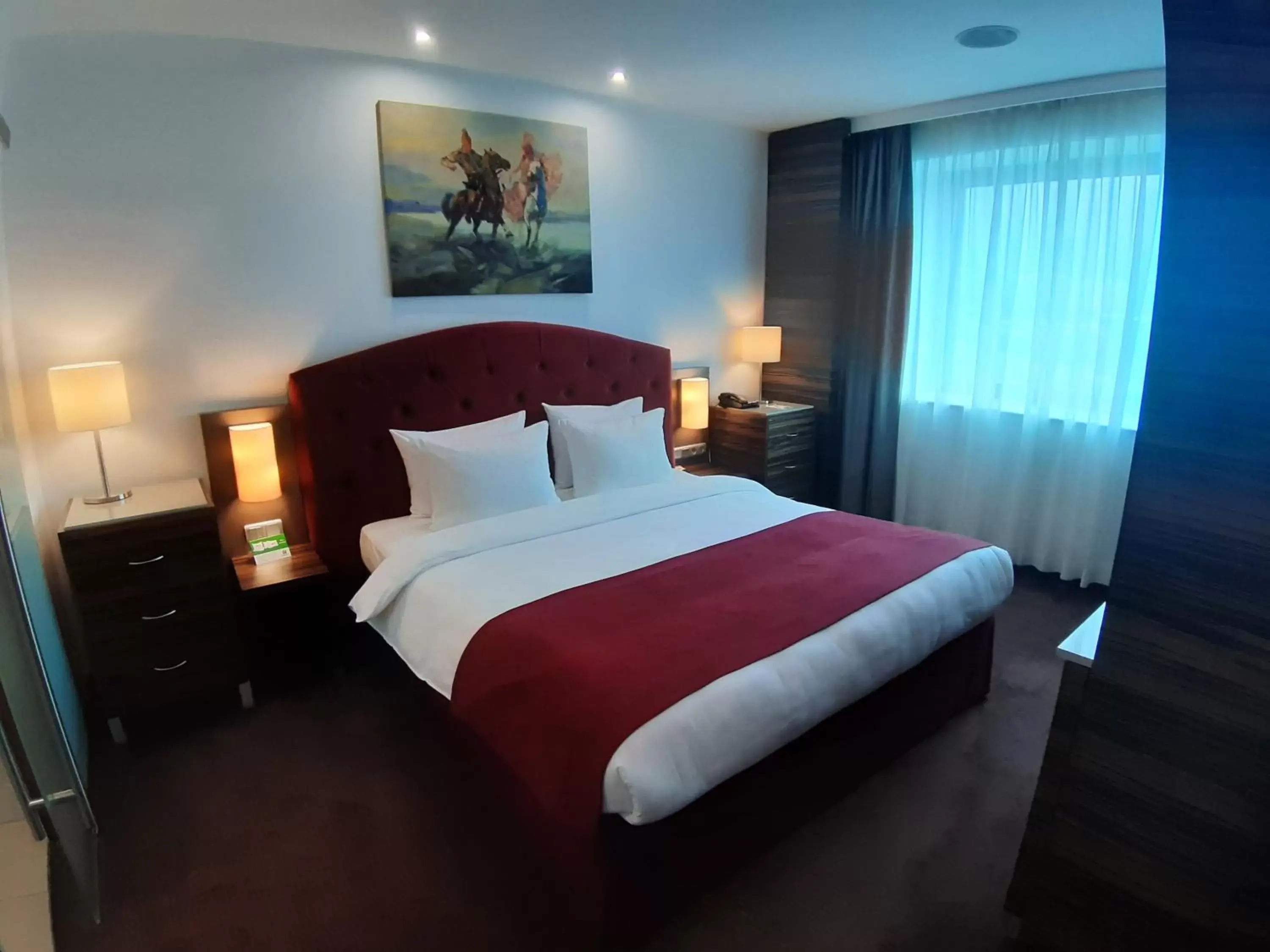 Bed in Holiday Inn Almaty, an IHG Hotel
