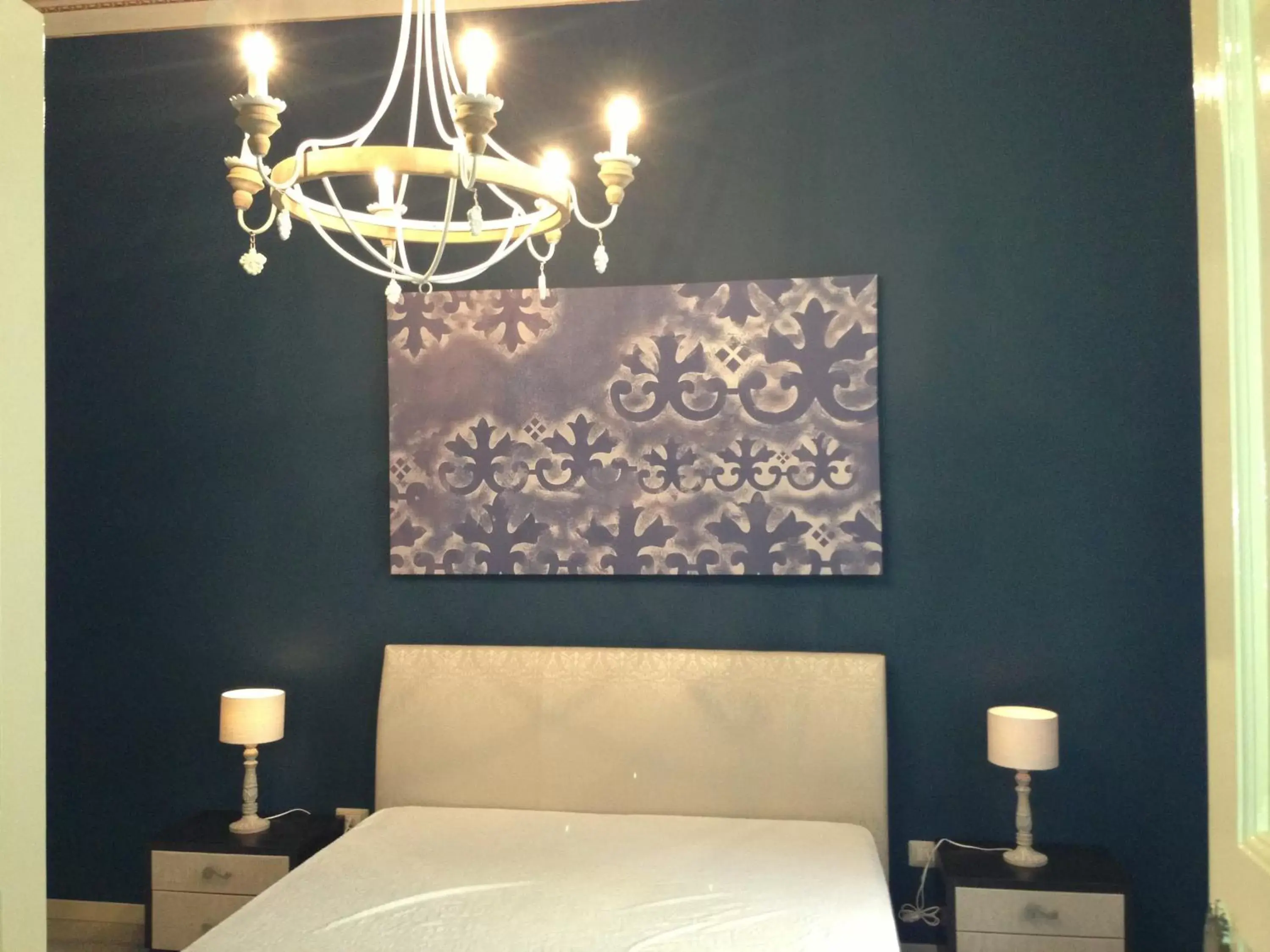 Decorative detail, Bed in Albergo Diffuso Dimora Rossi