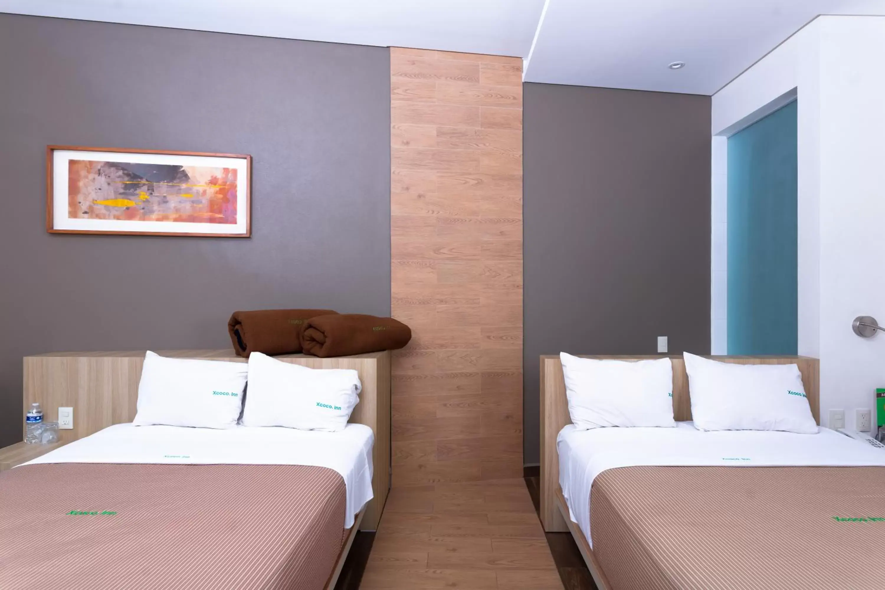 Bed in Hotel Xcoco Inn