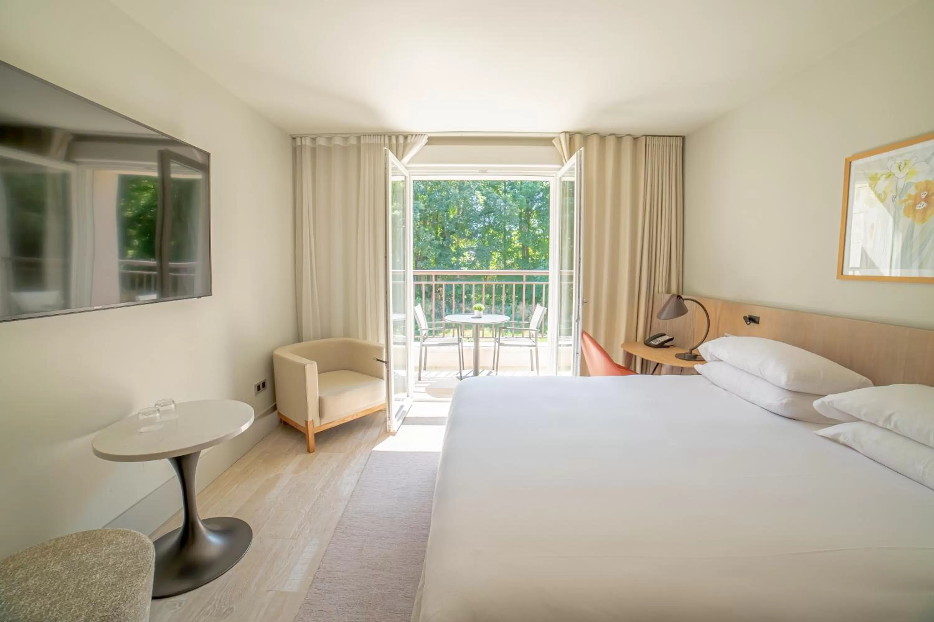 Bed in Le Grand Pavillon Chantilly