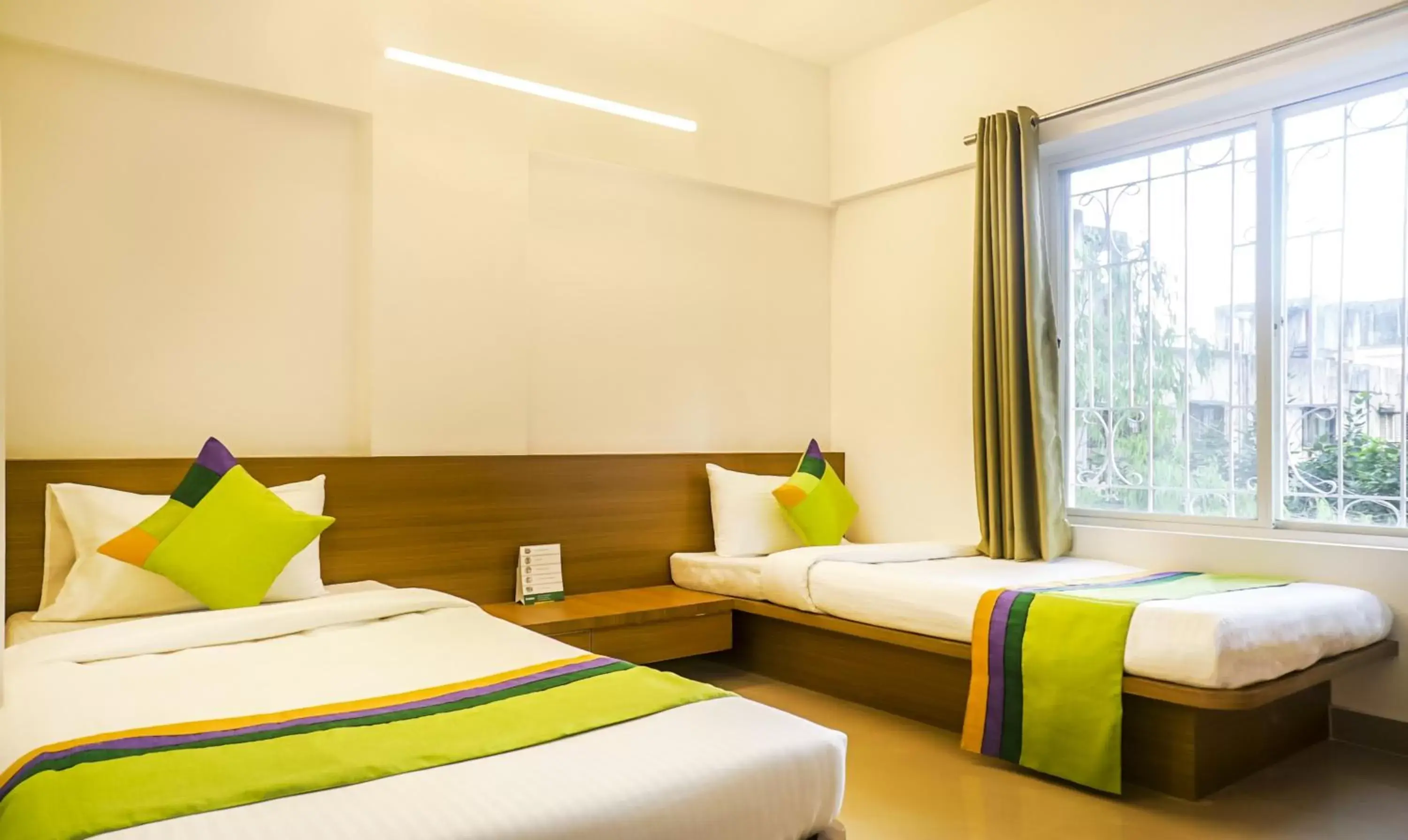 Bed in Treebo Luxe Suite, Shivaji Nagar Bed in Treebo Luxe Suite, Shivaji Nagar