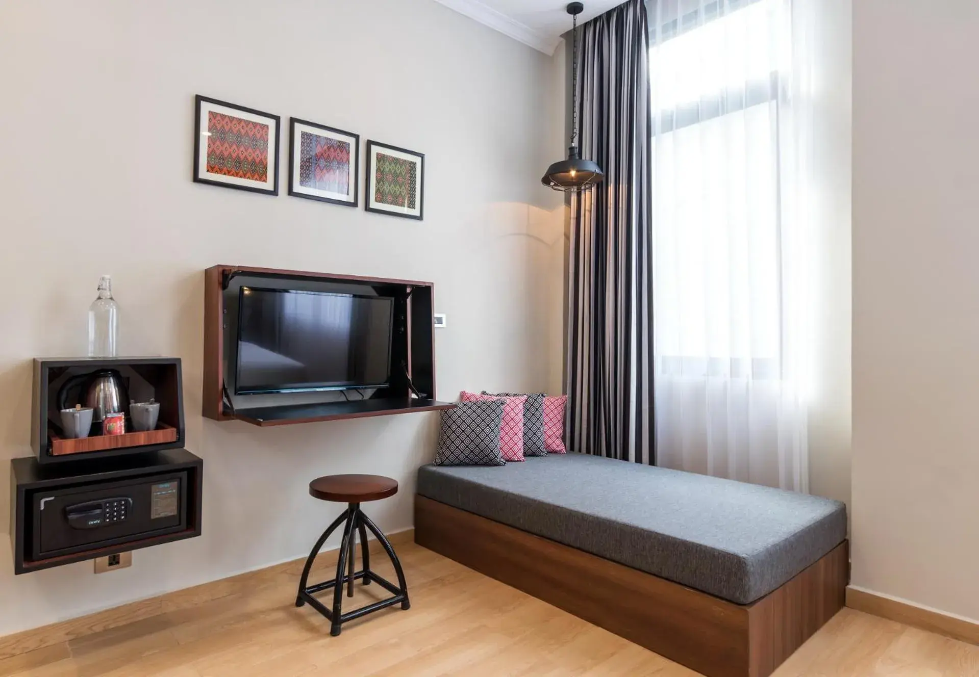 Bedroom, TV/Entertainment Center in S Loft Manado