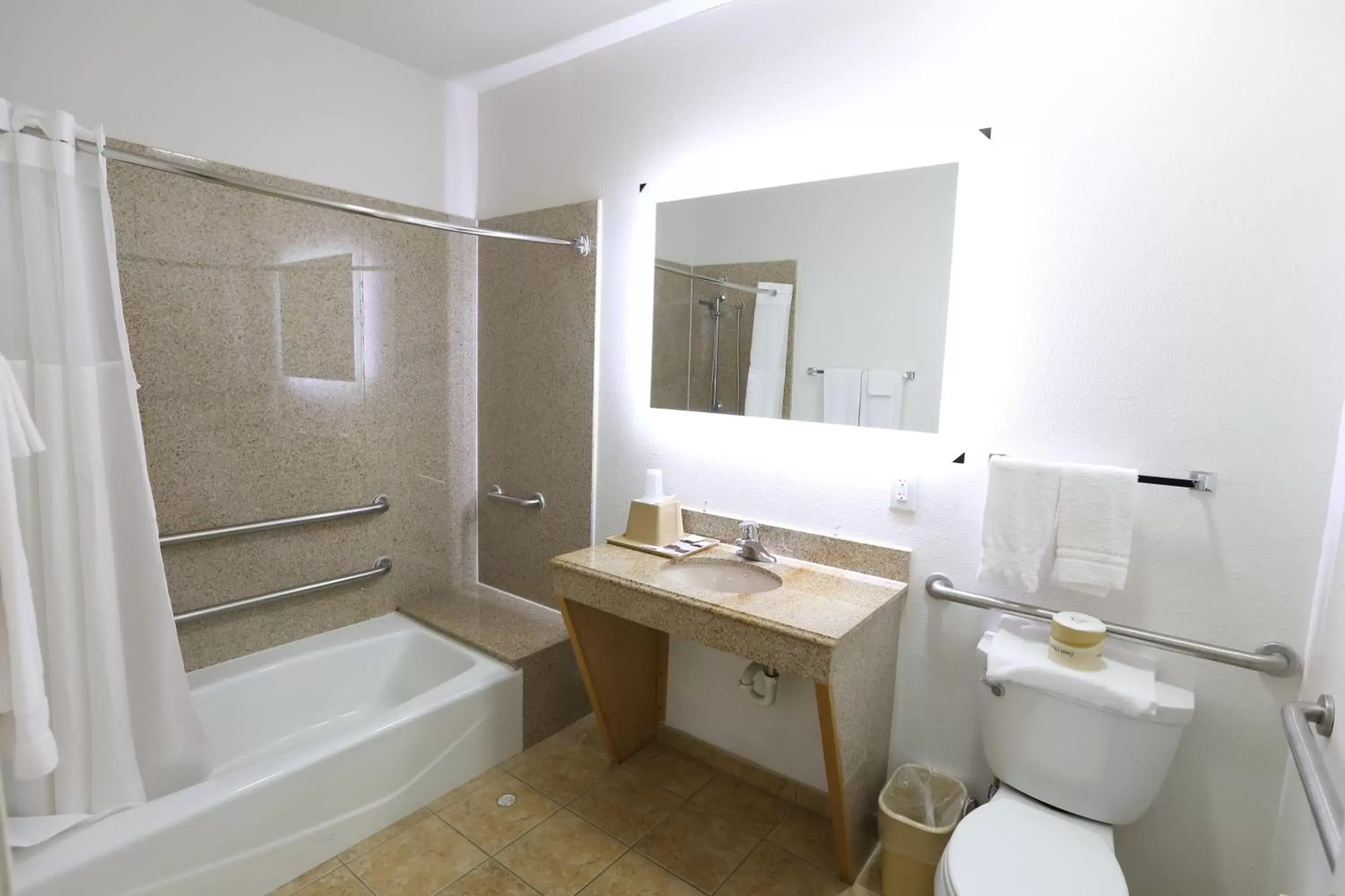 Toilet, Bathroom in Executive Inn & Suites Cuero