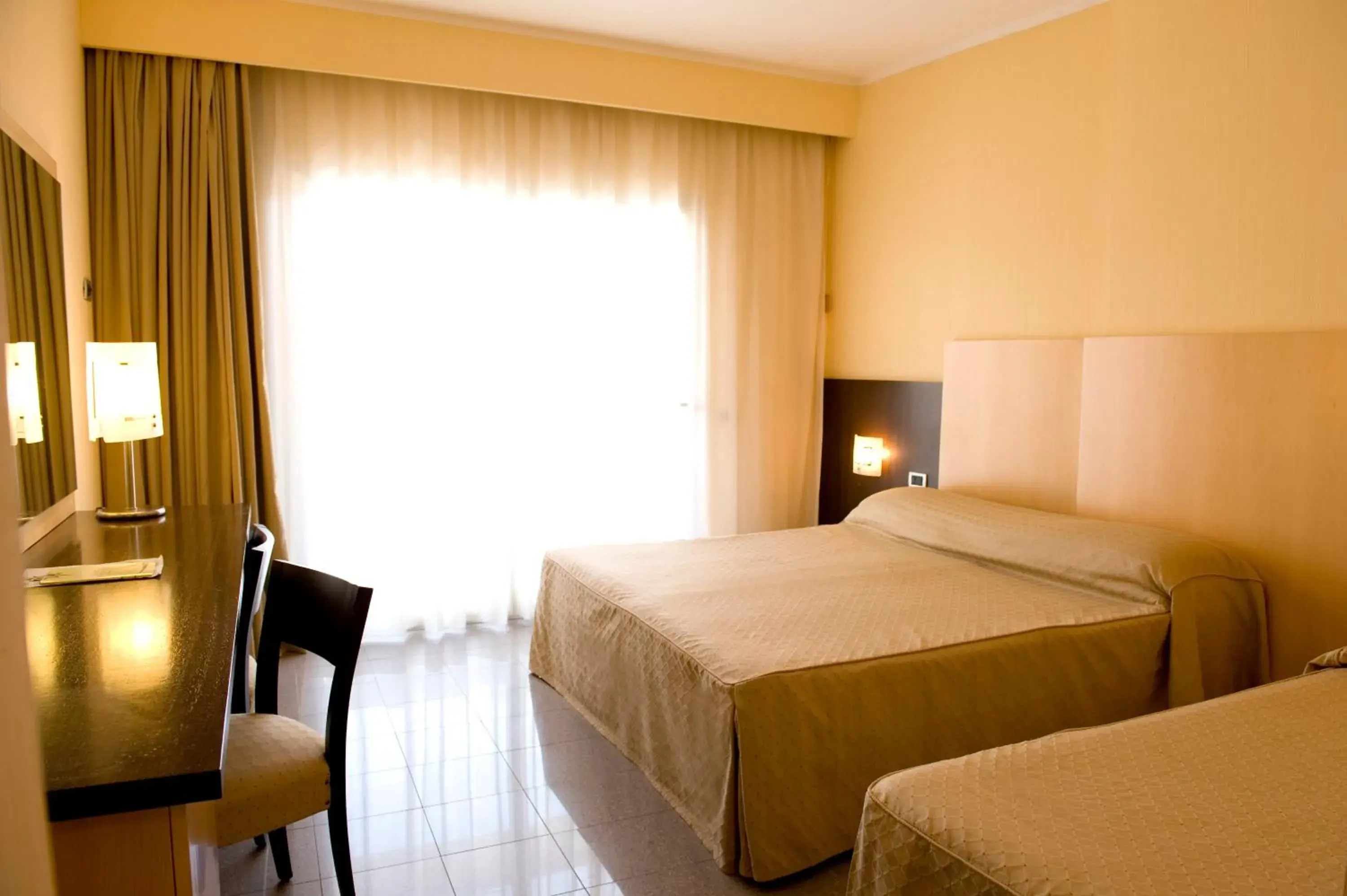 Photo of the whole room, Bed in Albergo Mediterraneo