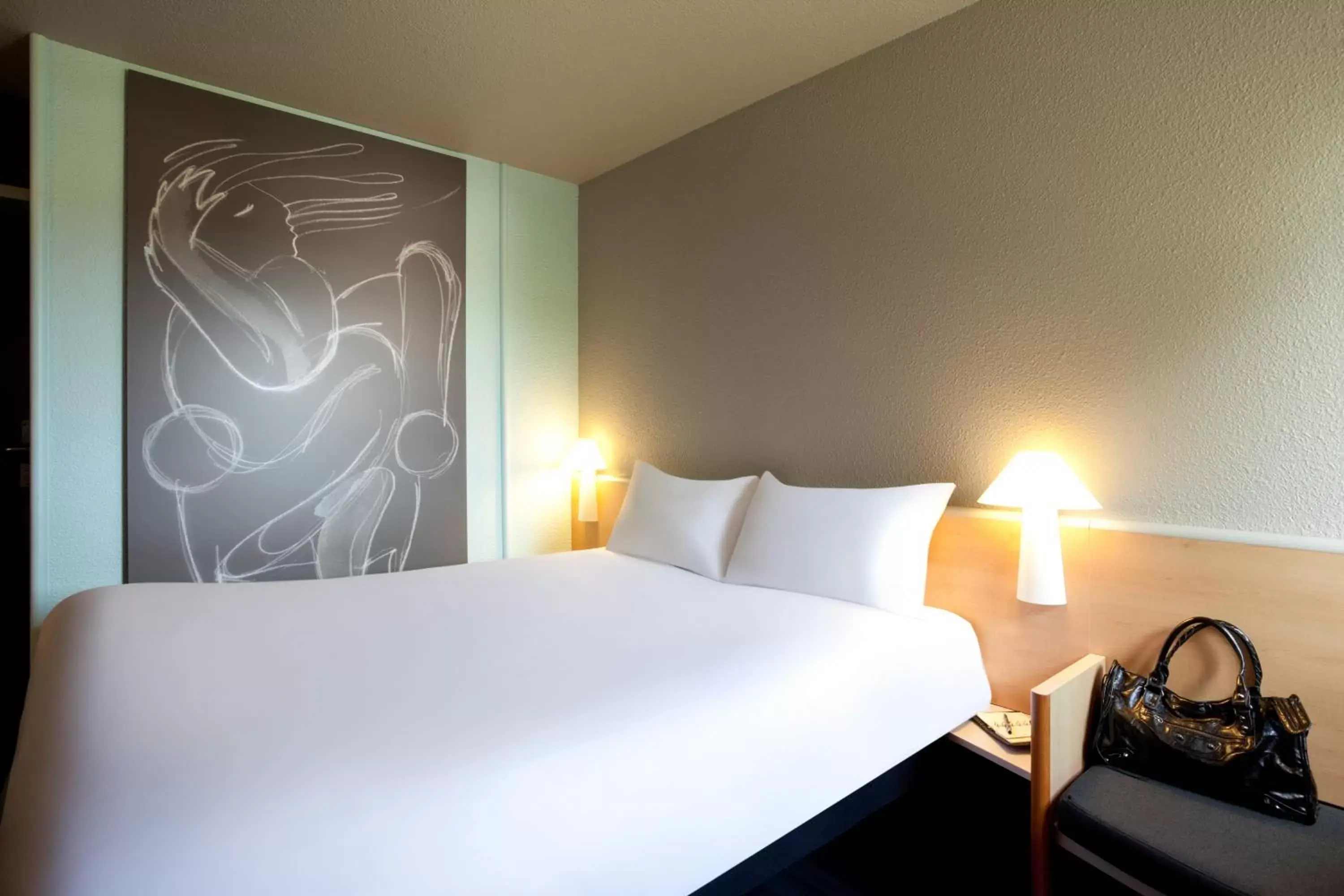 Bed in ibis Mulhouse Ile Napoleon