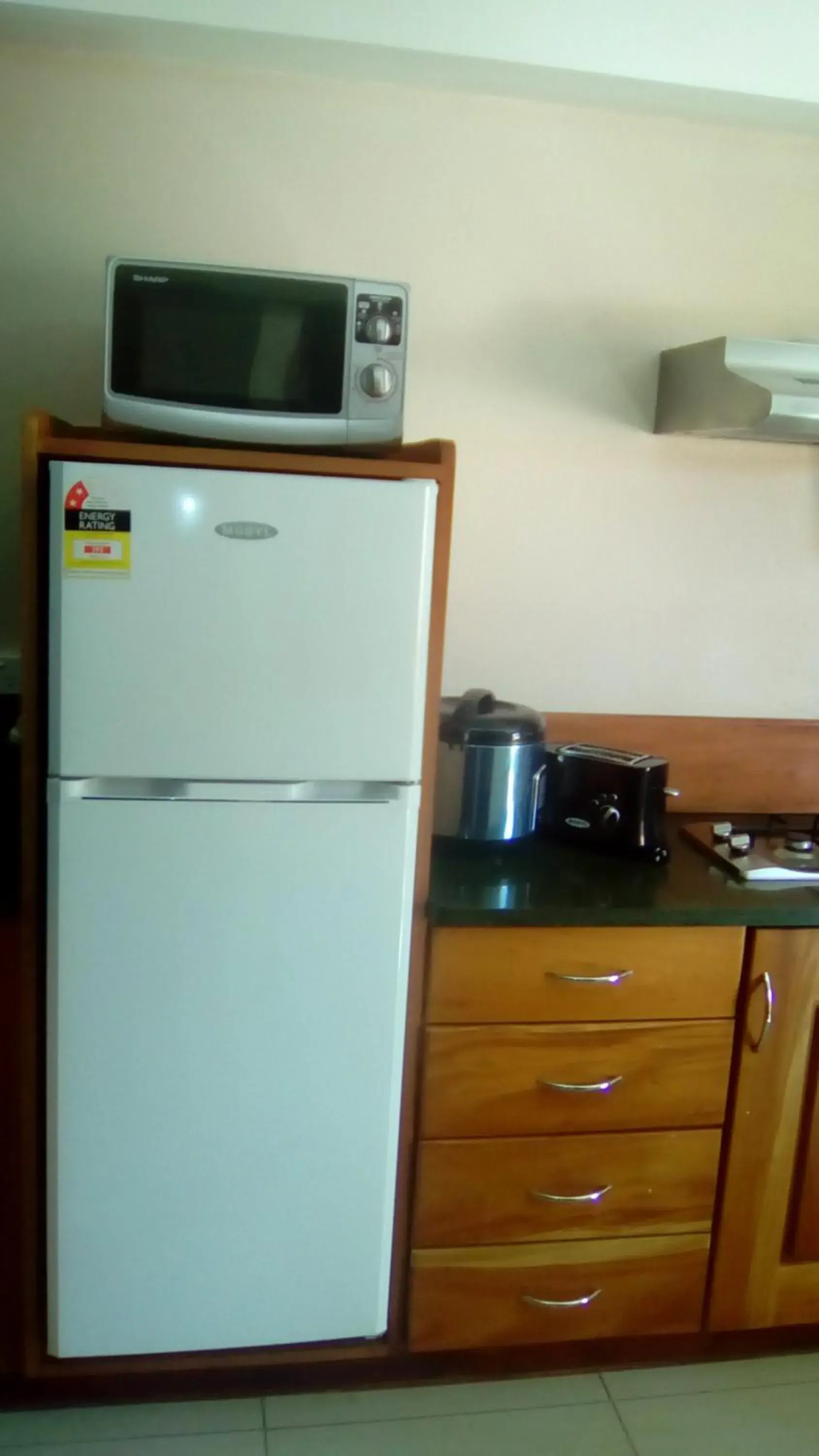 Kitchen/Kitchenette in Al - Minhaj Service Apartments
