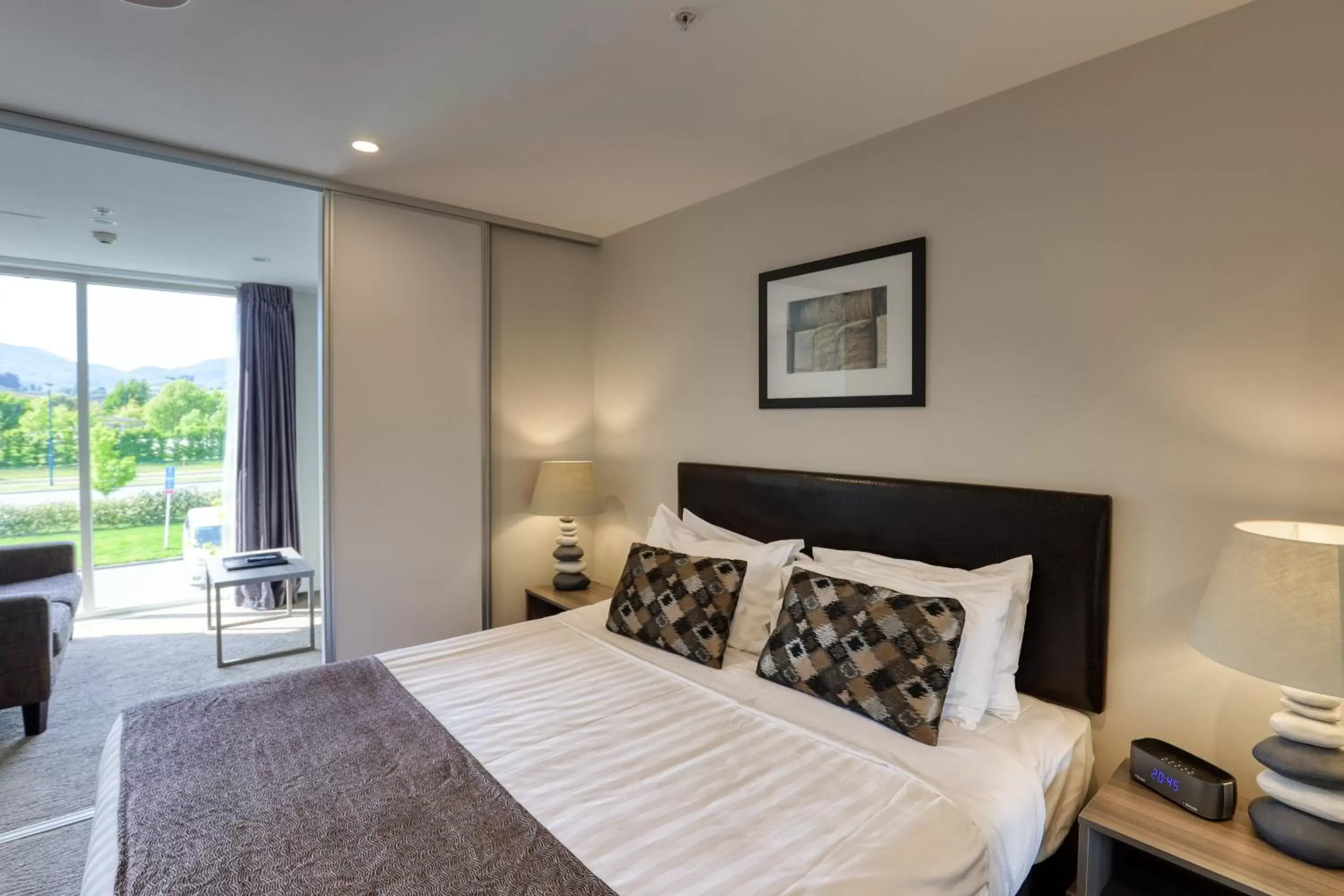 Bedroom, Bed in Ramada Suites by Wyndham Queenstown Remarkables Park