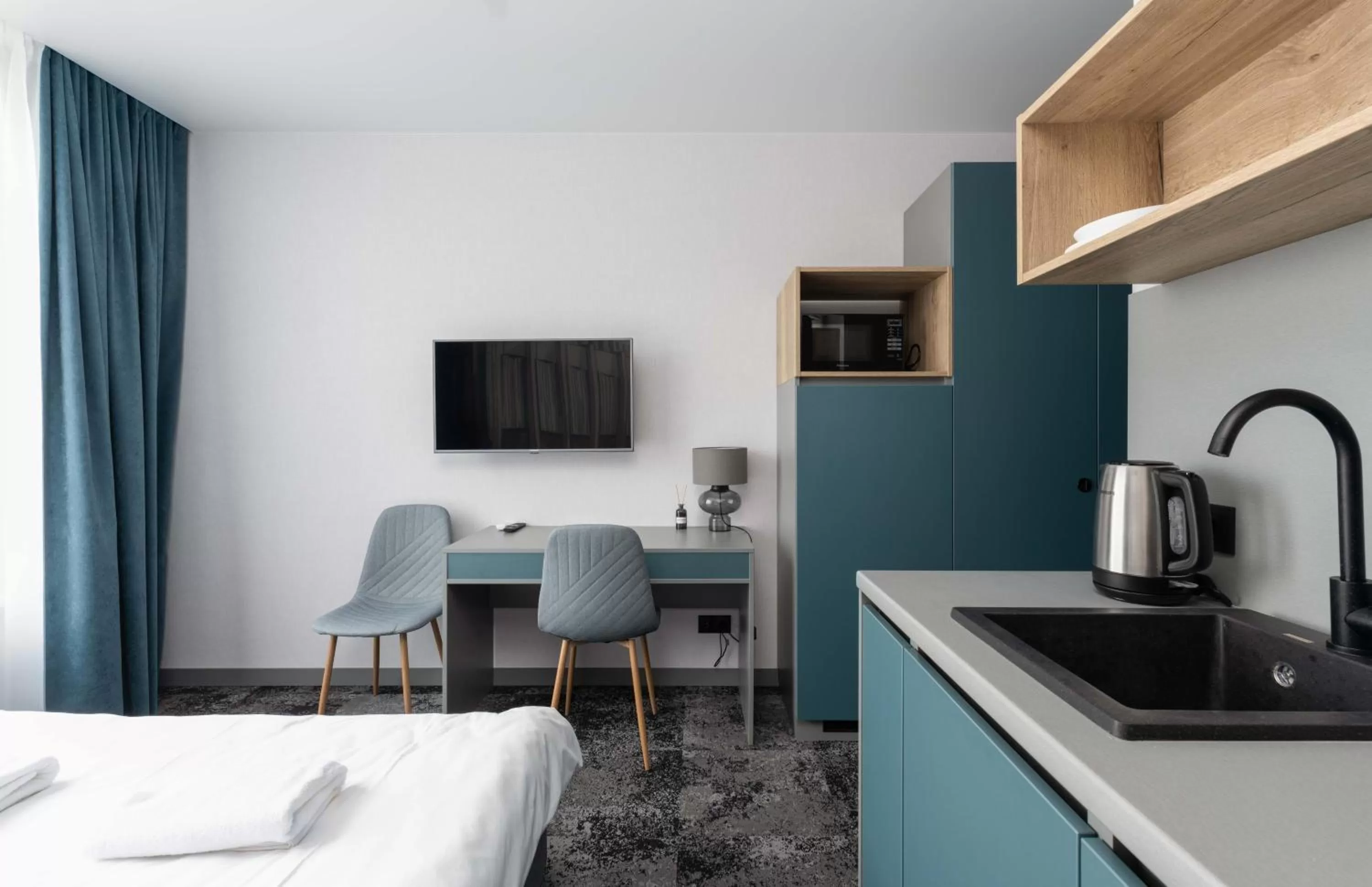 Bed, Kitchen/Kitchenette in Be The One Hotel