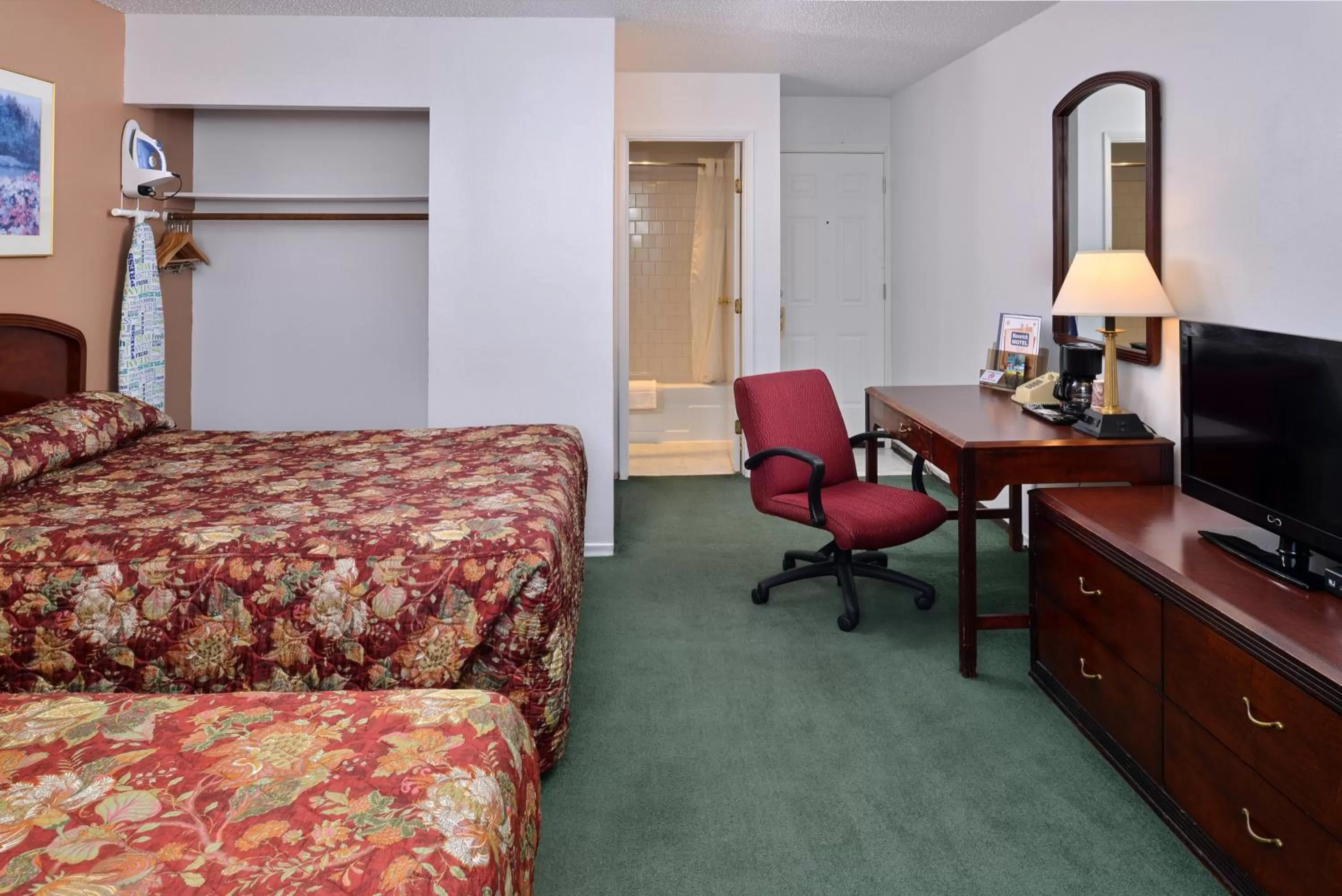 Decorative detail, Bed in Maverick Motel - Modern Renovated Motel