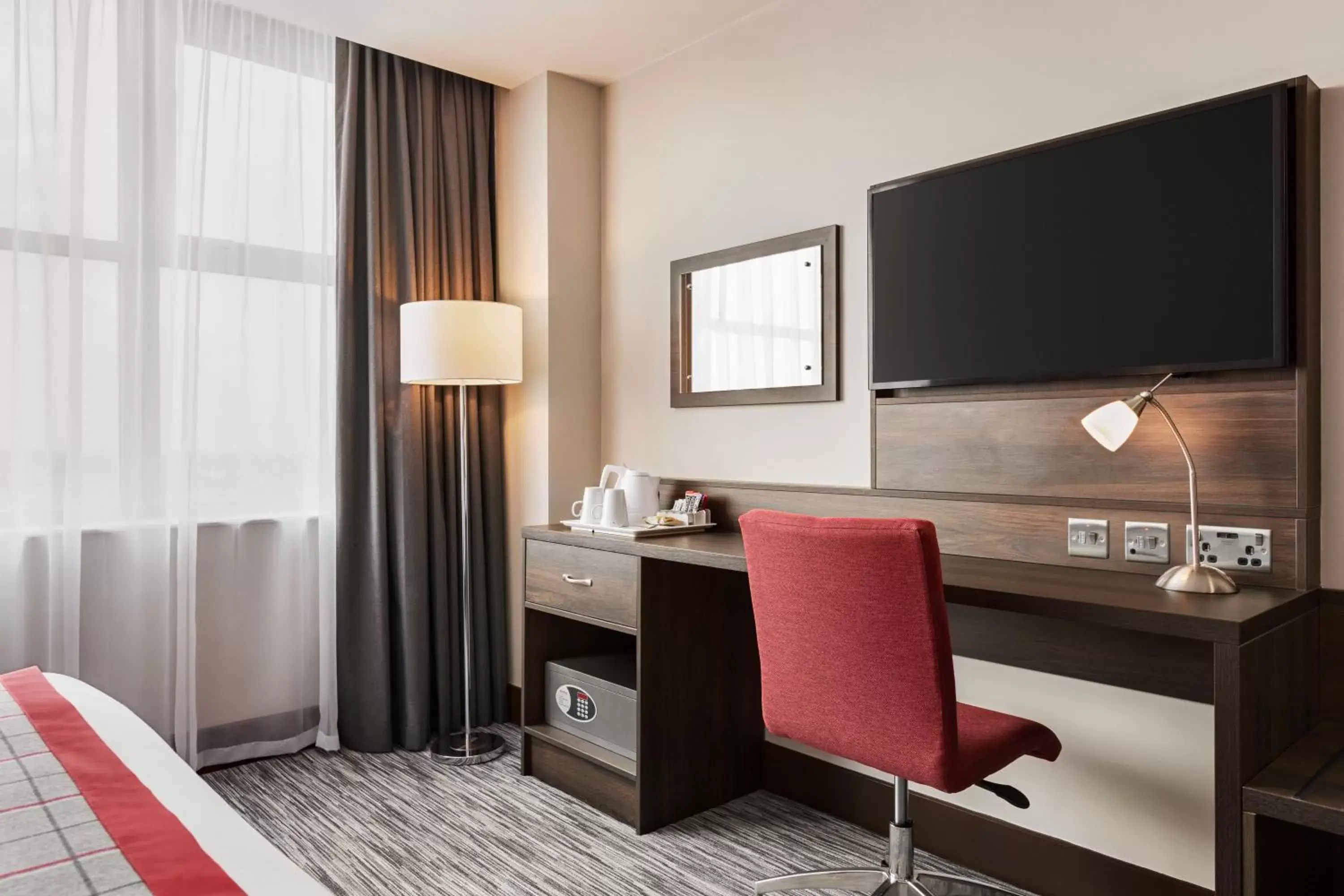 TV and multimedia, TV/Entertainment Center in Ramada by Wyndham East Kilbride