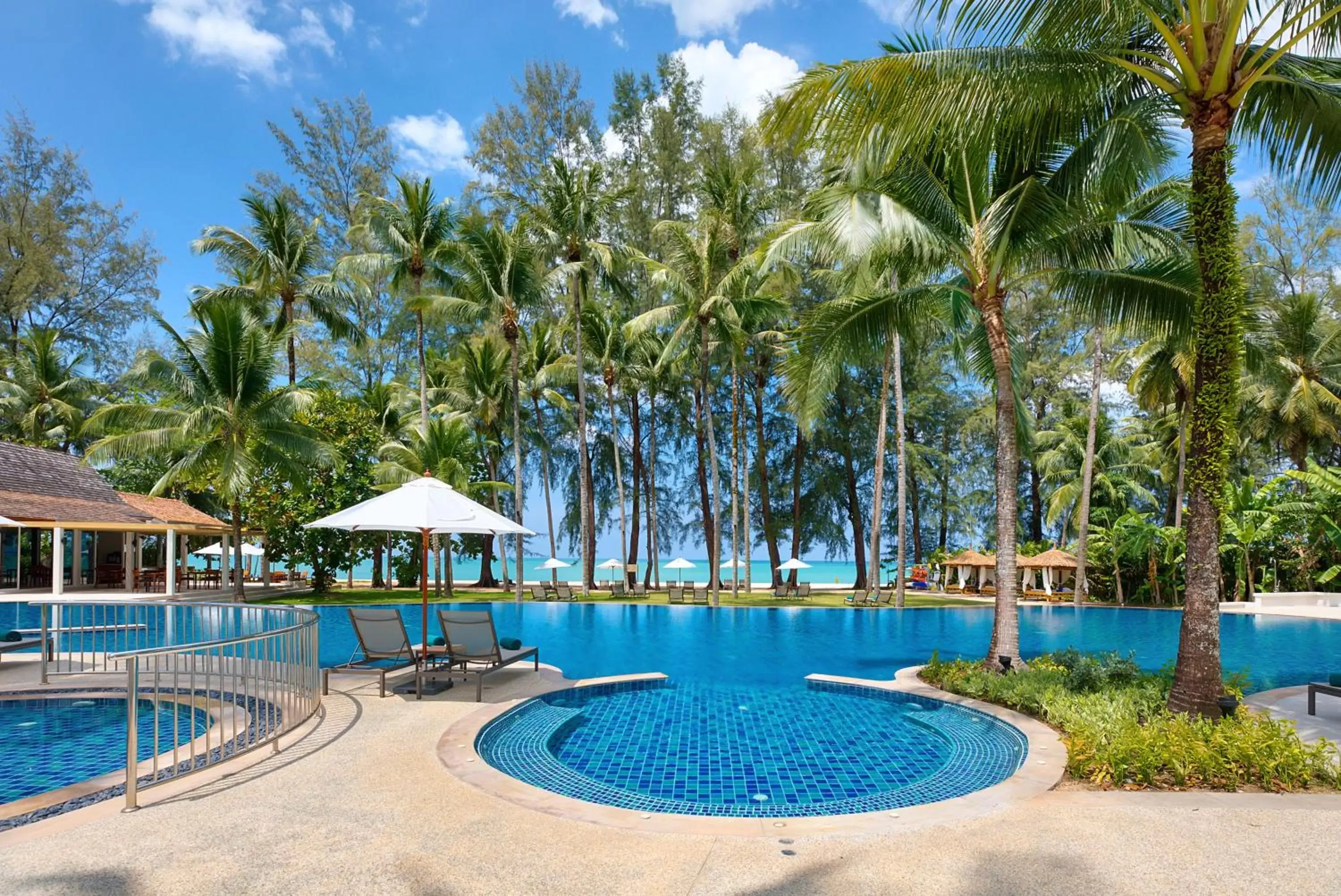 Swimming Pool in Outrigger Khao Lak Beach Resort - SHA Extra Plus