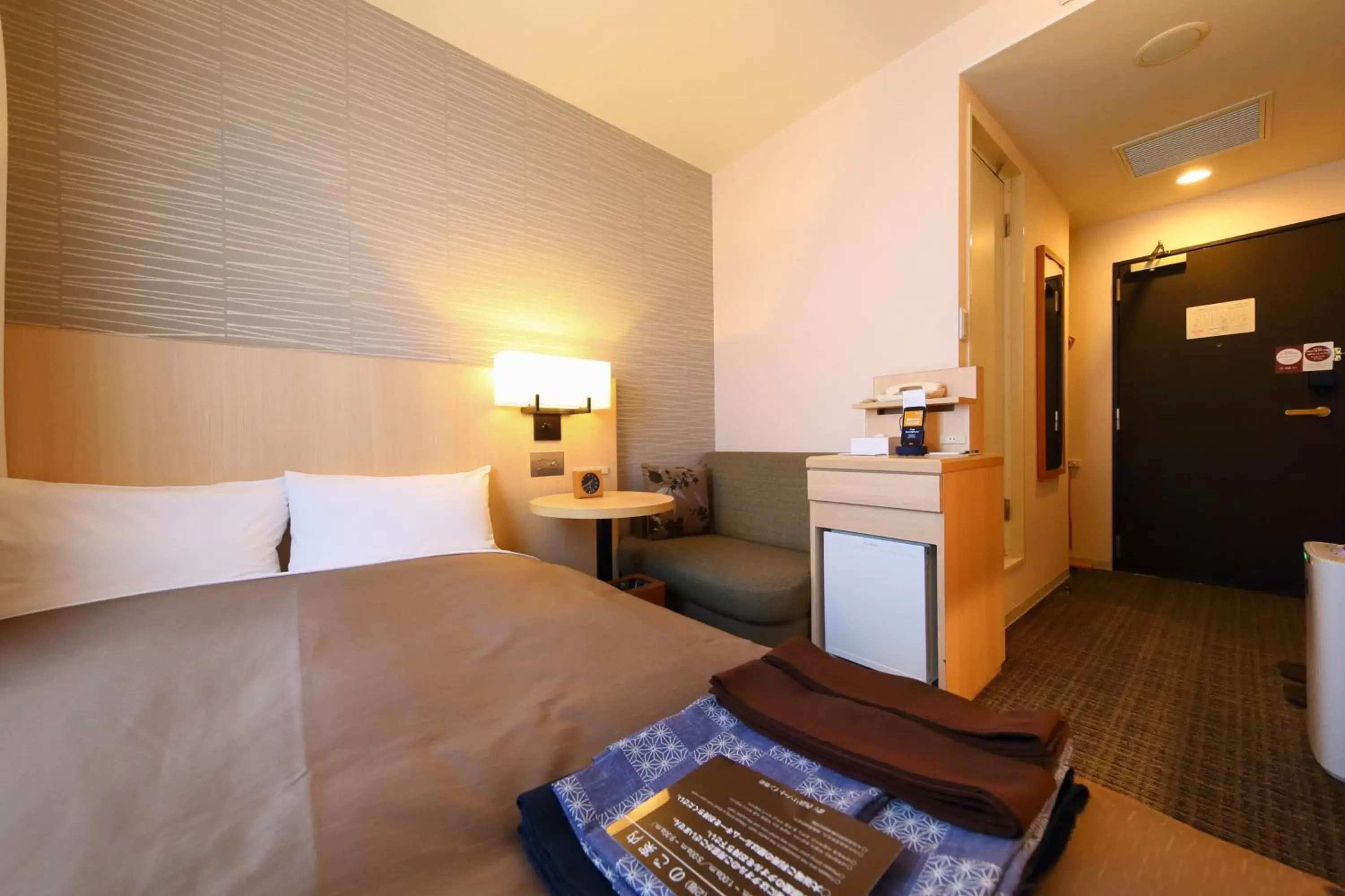Photo of the whole room, Bed in Nishitetsu Resort Inn Beppu