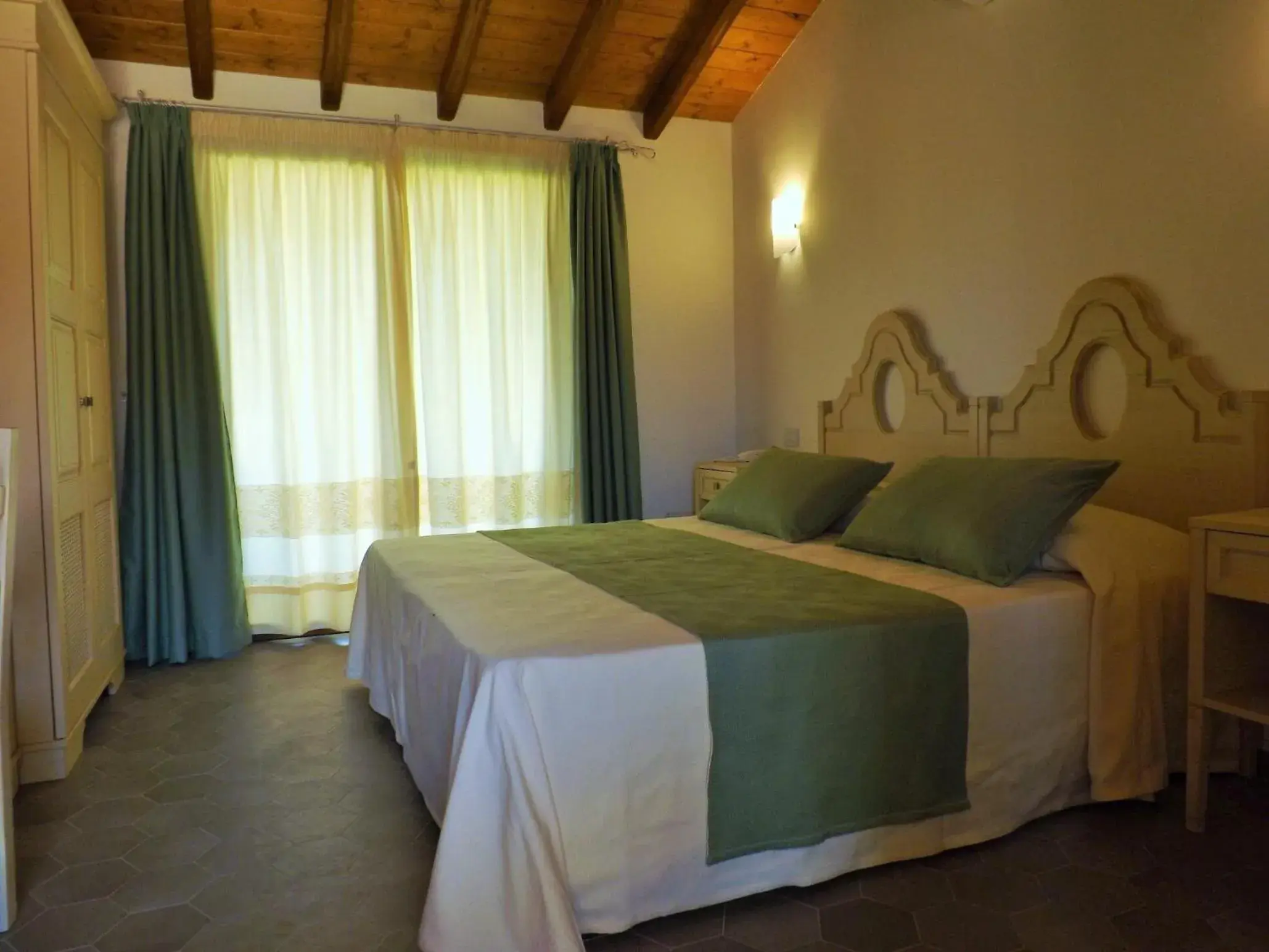 Double Room with Patio and Garden View in Le Anfore Hotel