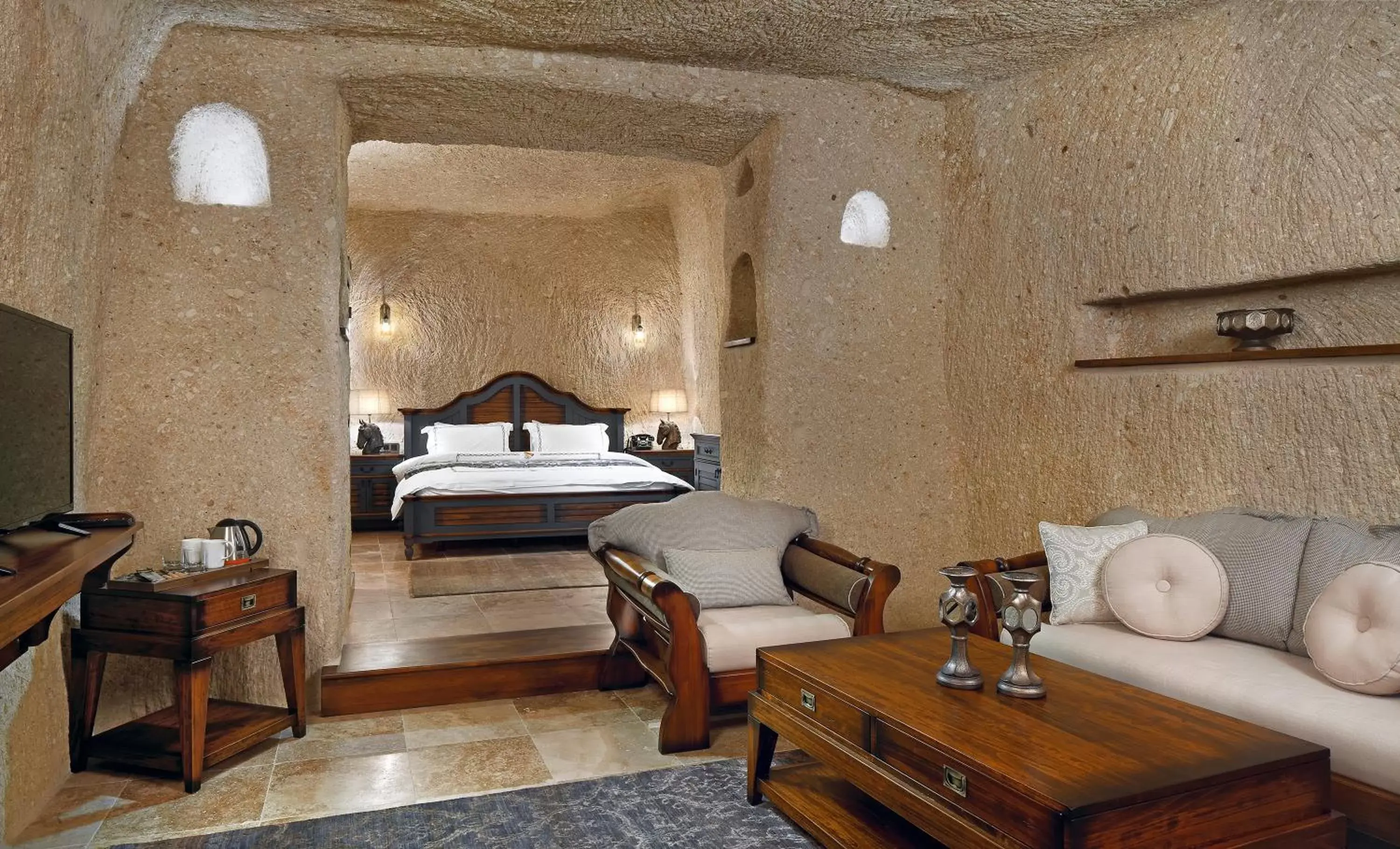 Bed in Seraphim Cave Suites & SPA